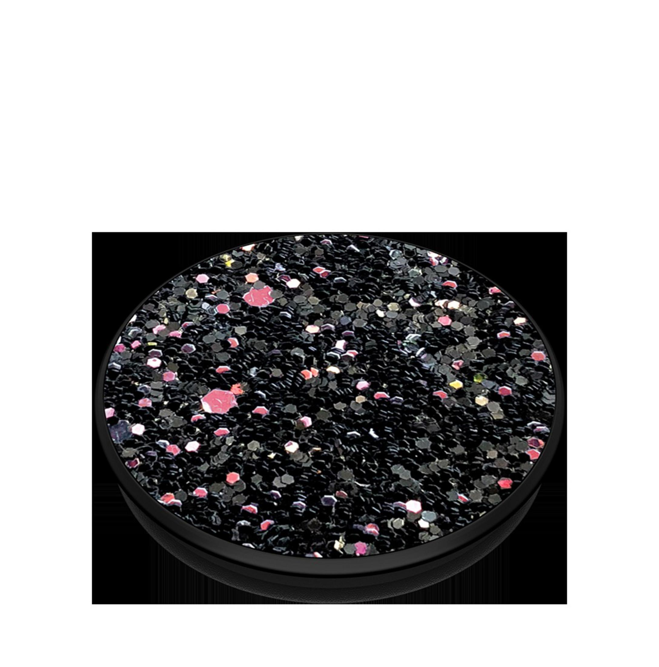 PopSockets negro con partículas de purpurina negra y rosa sobre superficie negra.