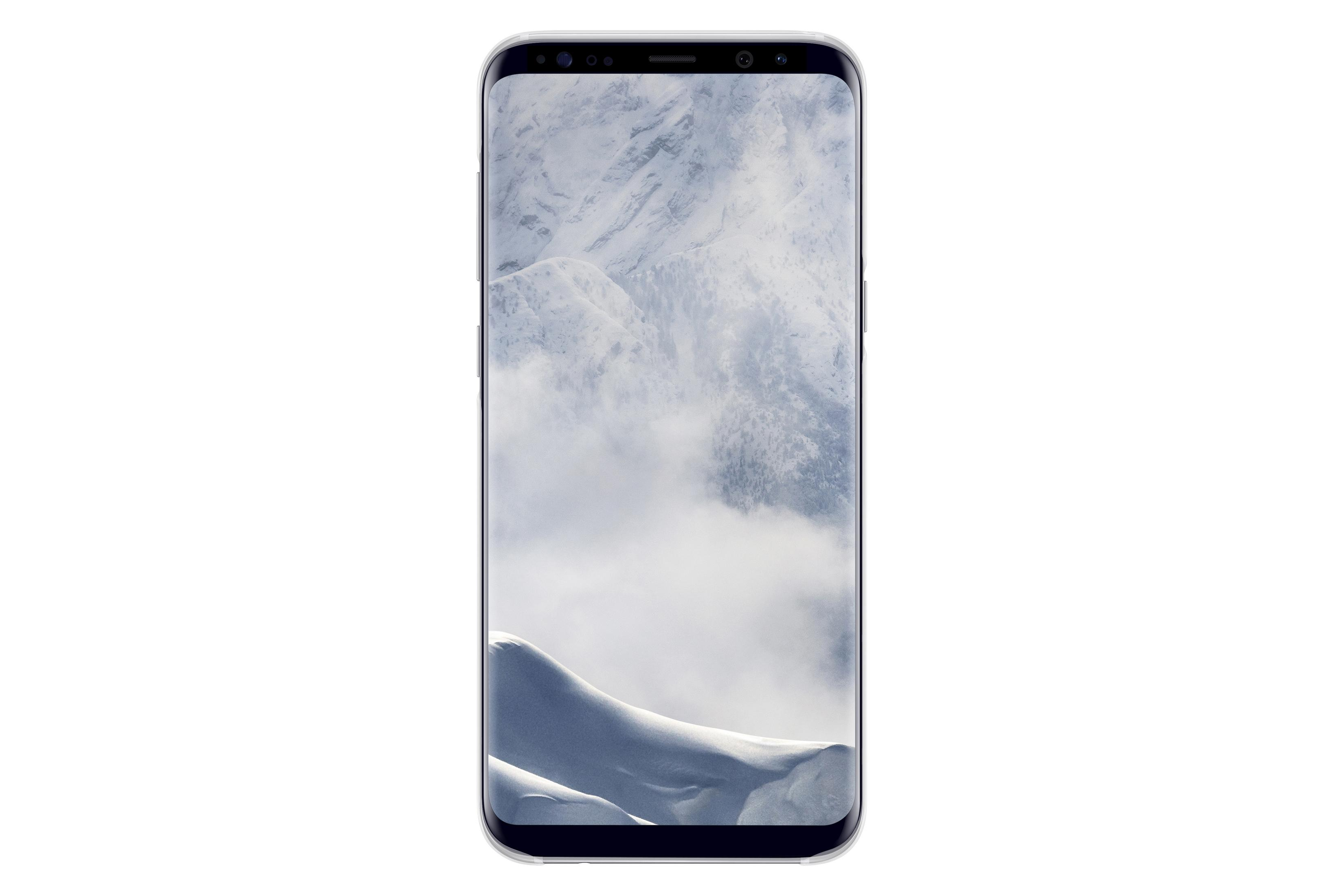 Uno smartphone con schermo bianco che mostra un paesaggio montano innevato.