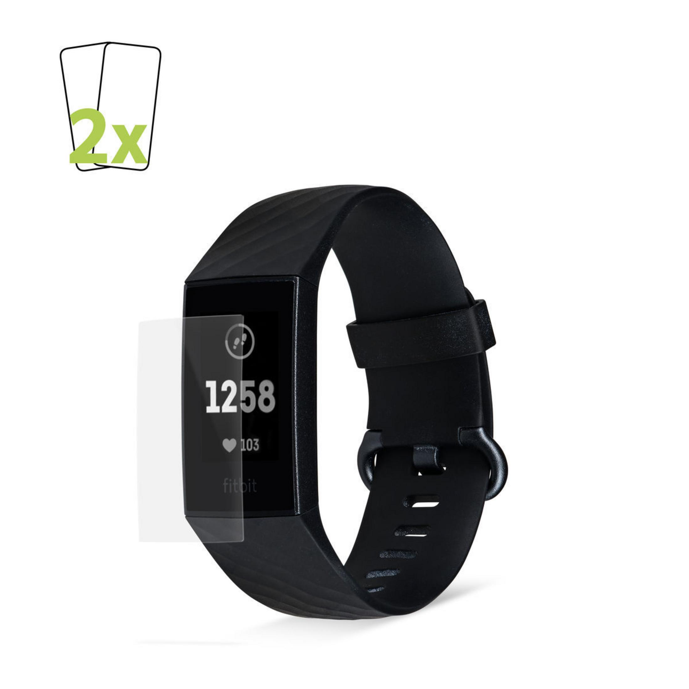 Un rastreador de actividad física con protector de pantalla, mostrando hora.