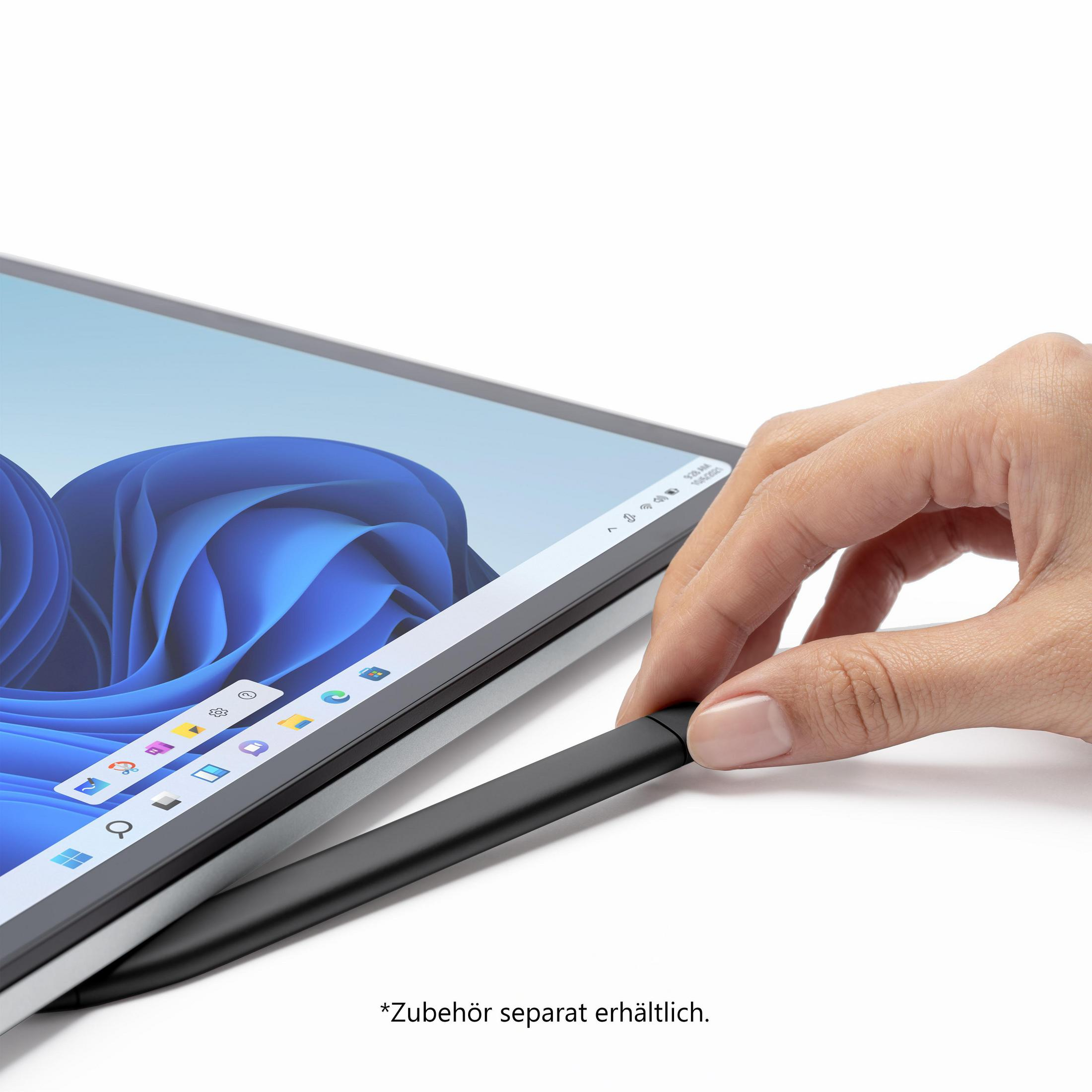 Eine Hand hält einen schwarzen Stift in der Nähe eines Tablet-Bildschirms.