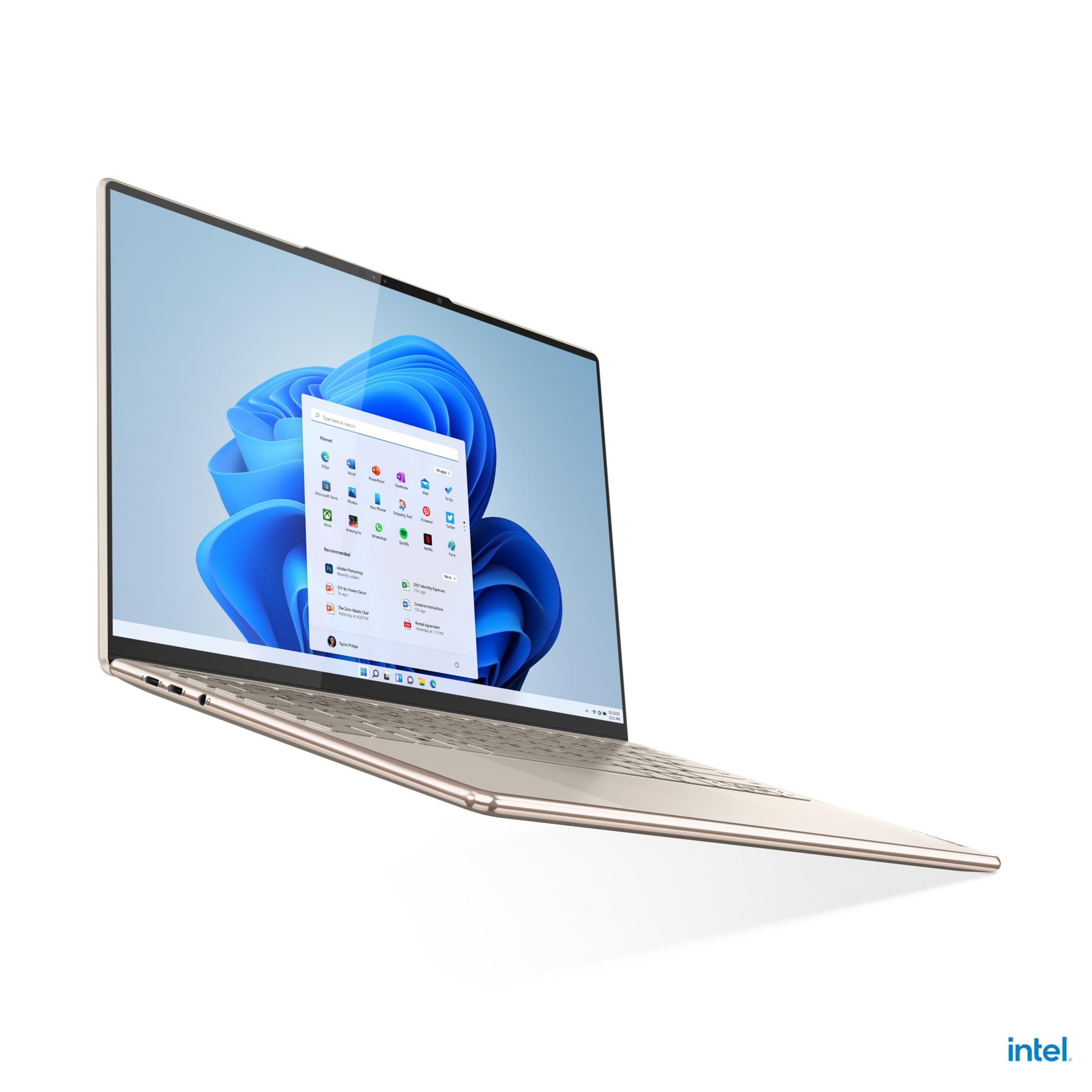 Beiger Laptop mit Windows-Bildschirm. Das Intel-Logo ist in der unteren Ecke sichtbar.