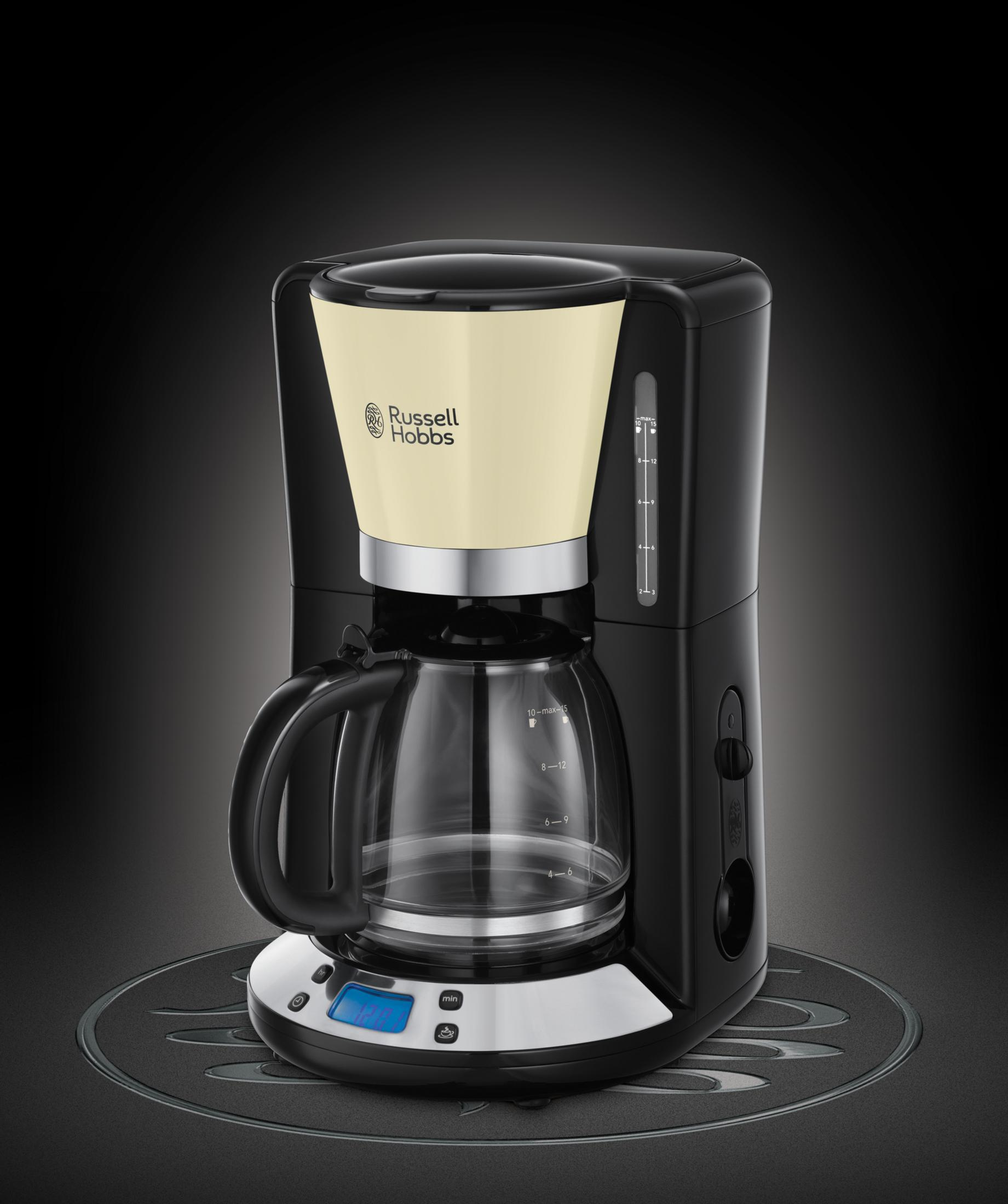 Czarny i kremowy ekspres do kawy. Szklana karafka znajduje się w podstawie. Nazwa marki to Russell Hobbs.