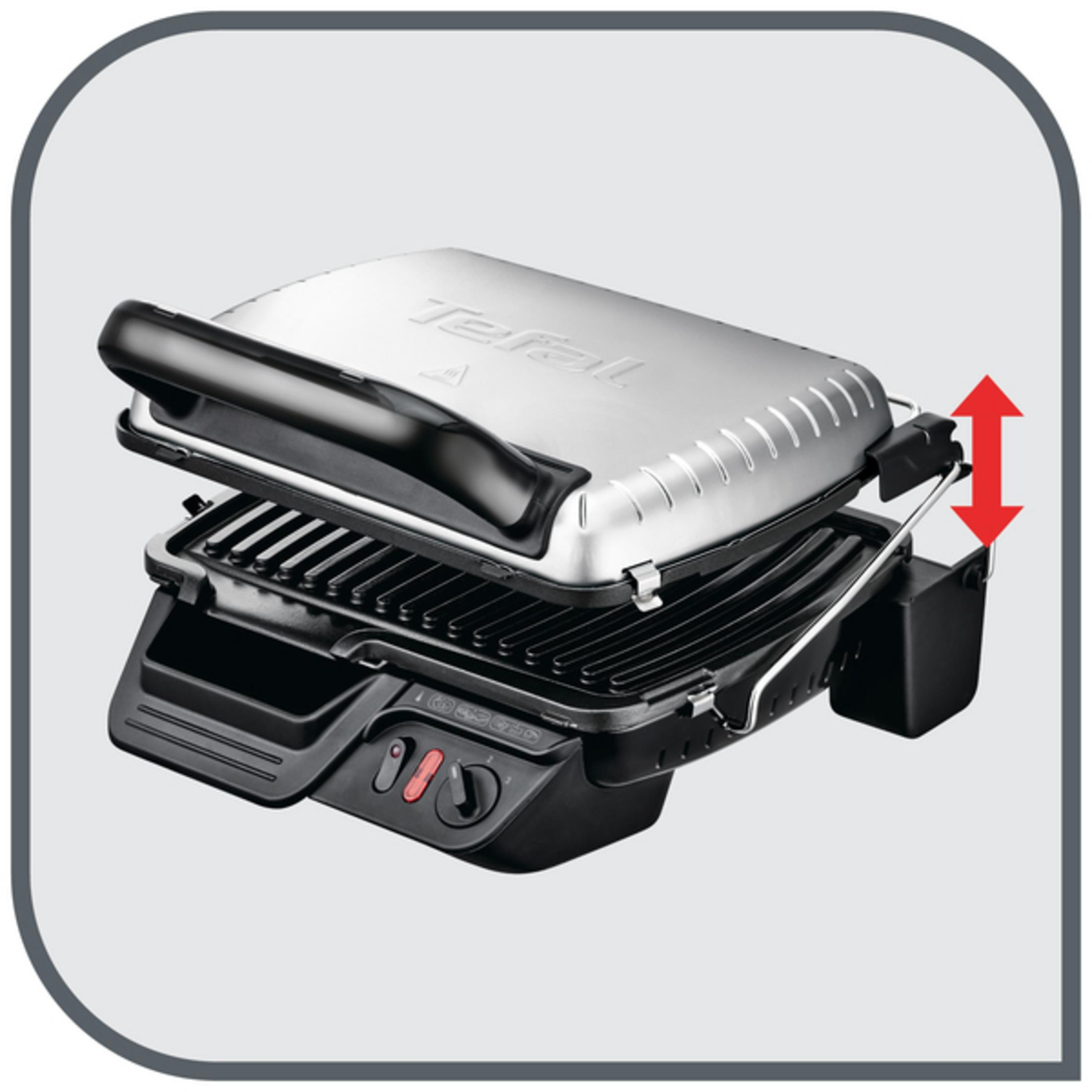 Silber-schwarzer Tefal-Grill, geöffnet. Rote Pfeile zeigen die Bewegung des Oberteils.