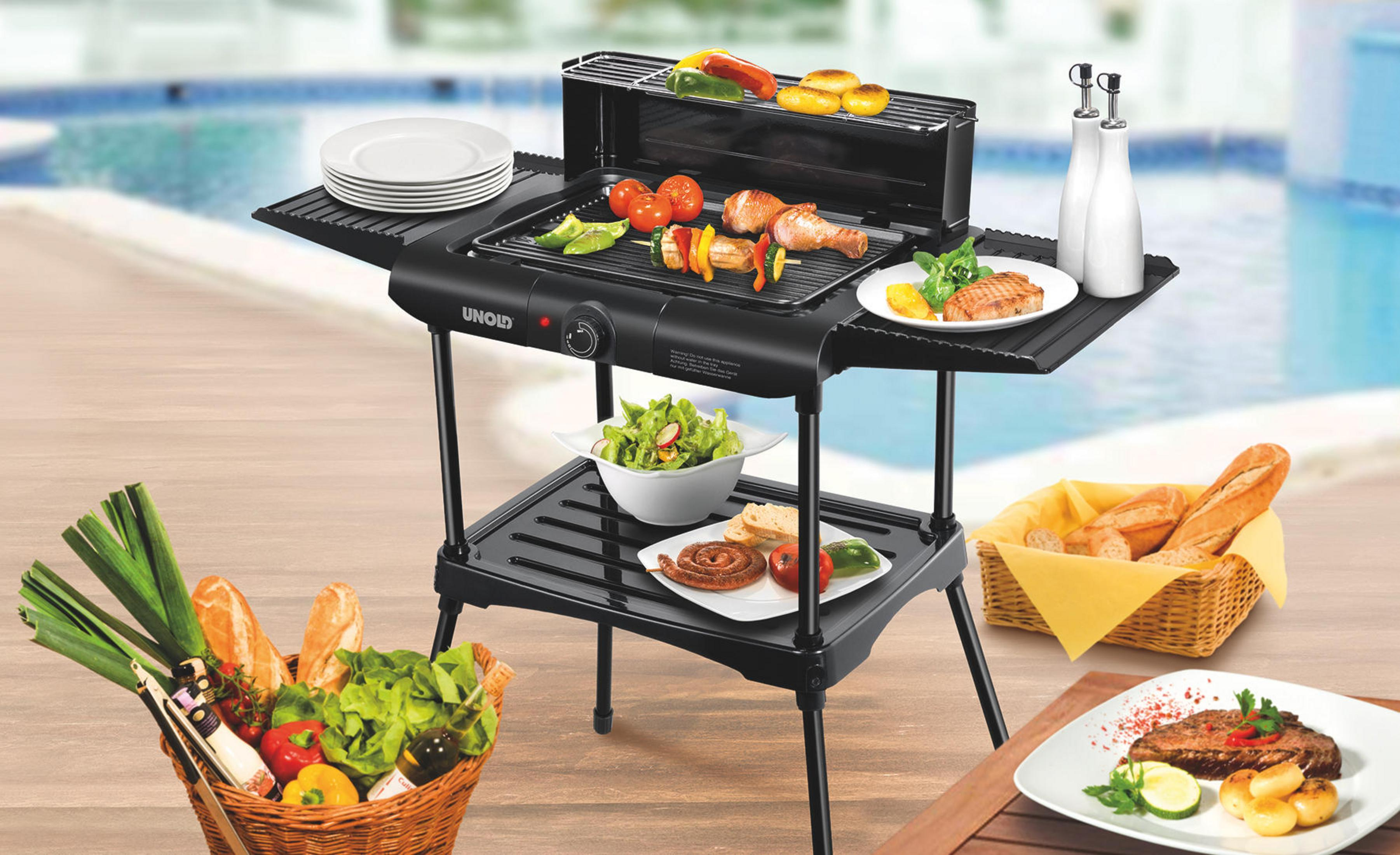 Ein schwarzer Smoker mit Thermometer und Gasventil.