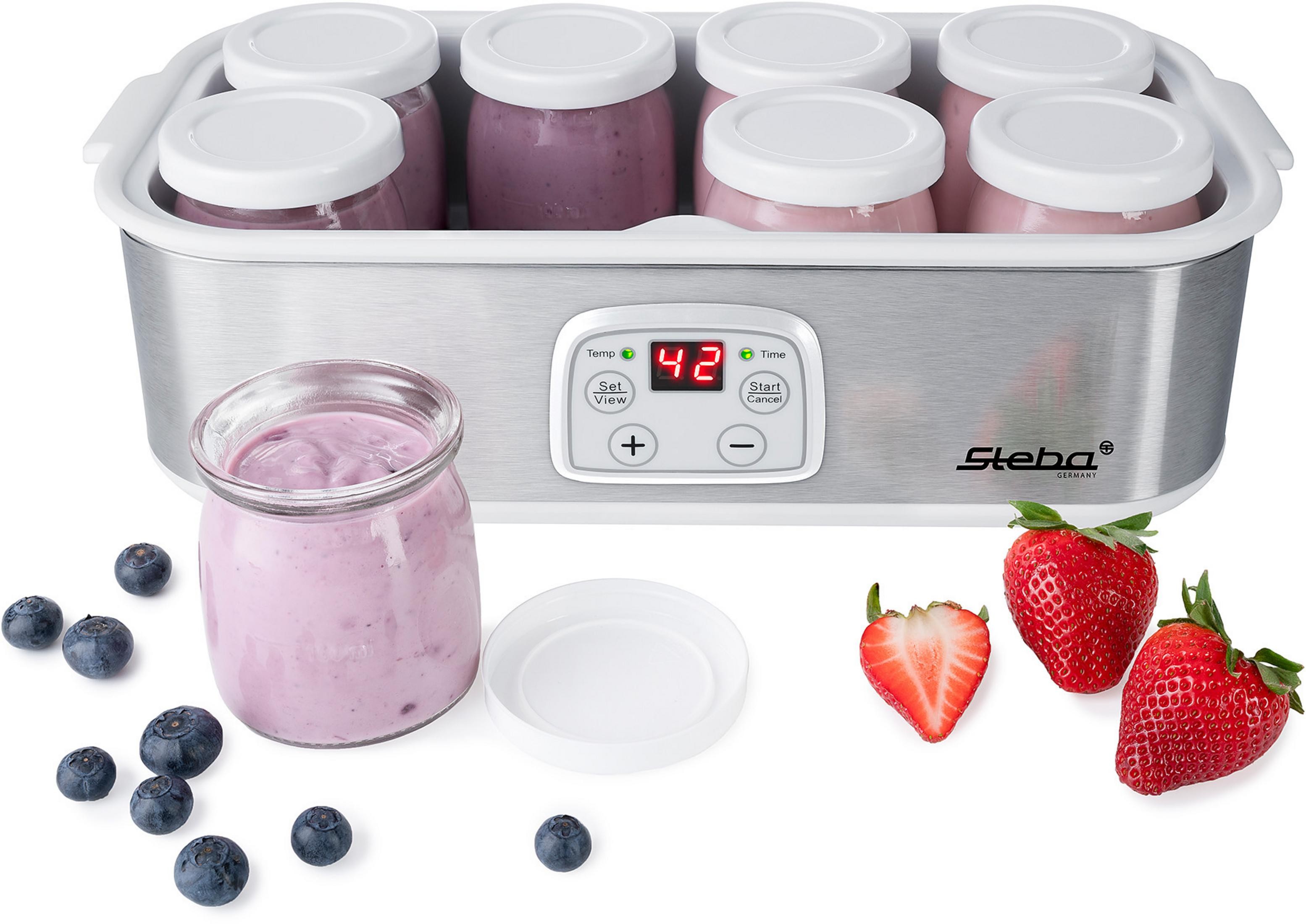 Ein Gerät mit Gläsern, gefüllt mit Joghurt, Blaubeeren und Erdbeeren. Es zeigt die Temperatur.