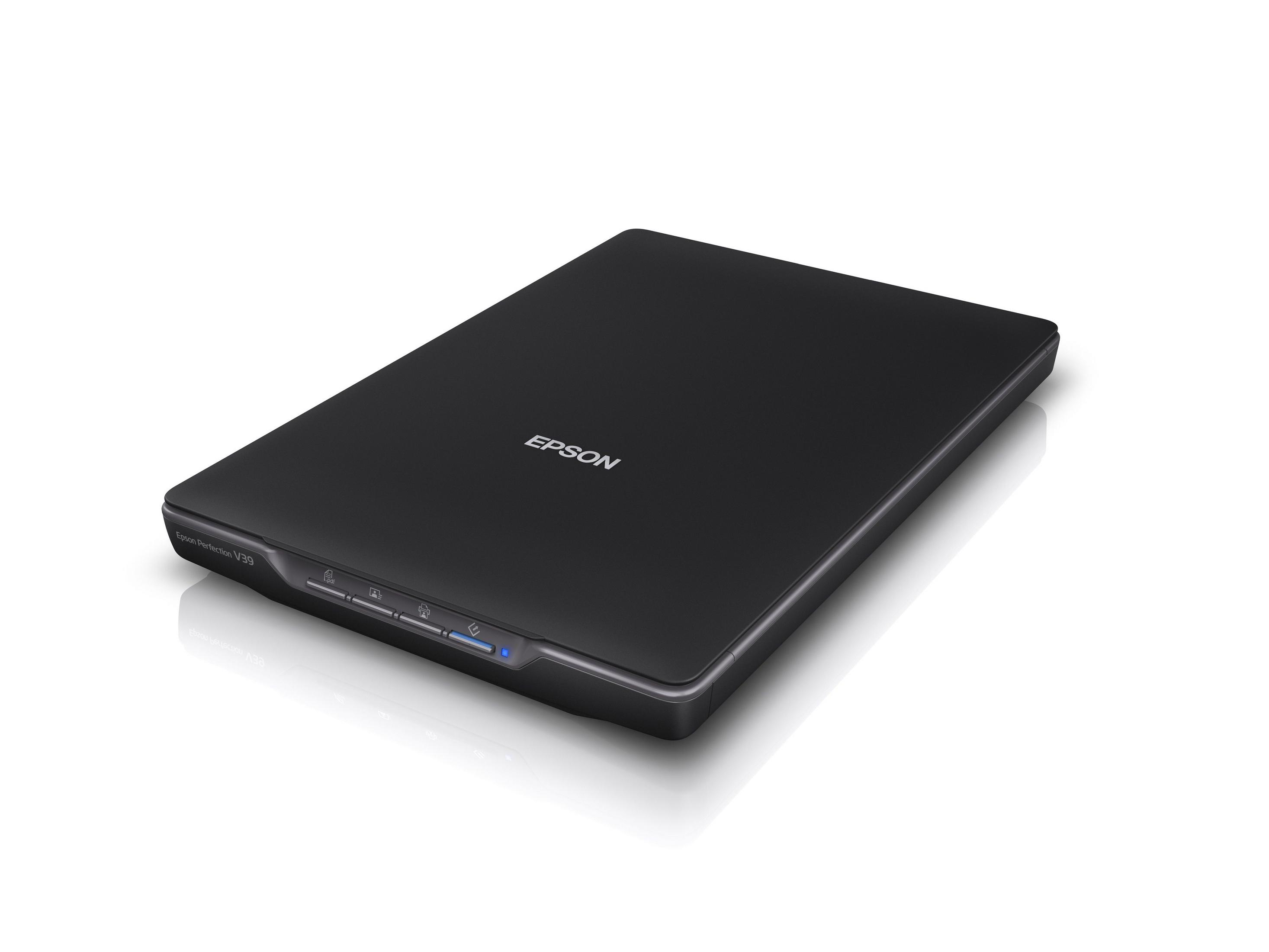 Un escáner de superficie plana negro con la marca 'Epson'. El escáner está sobre una superficie blanca.