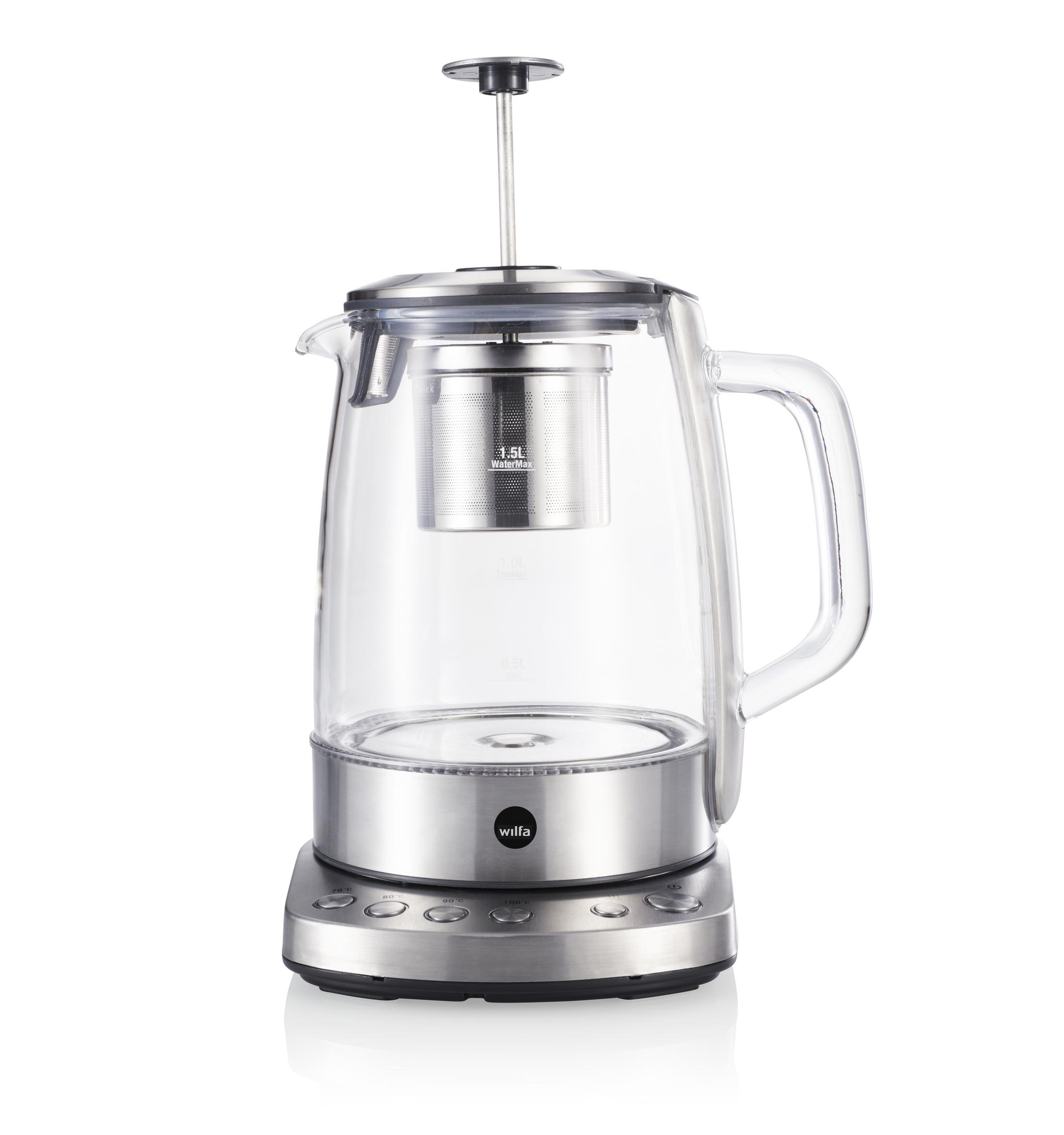 Ein elektrischer Glaskessel mit Edelstahlfuß. Der Wasserkocher hat einen Tee-Infuser im Inneren.