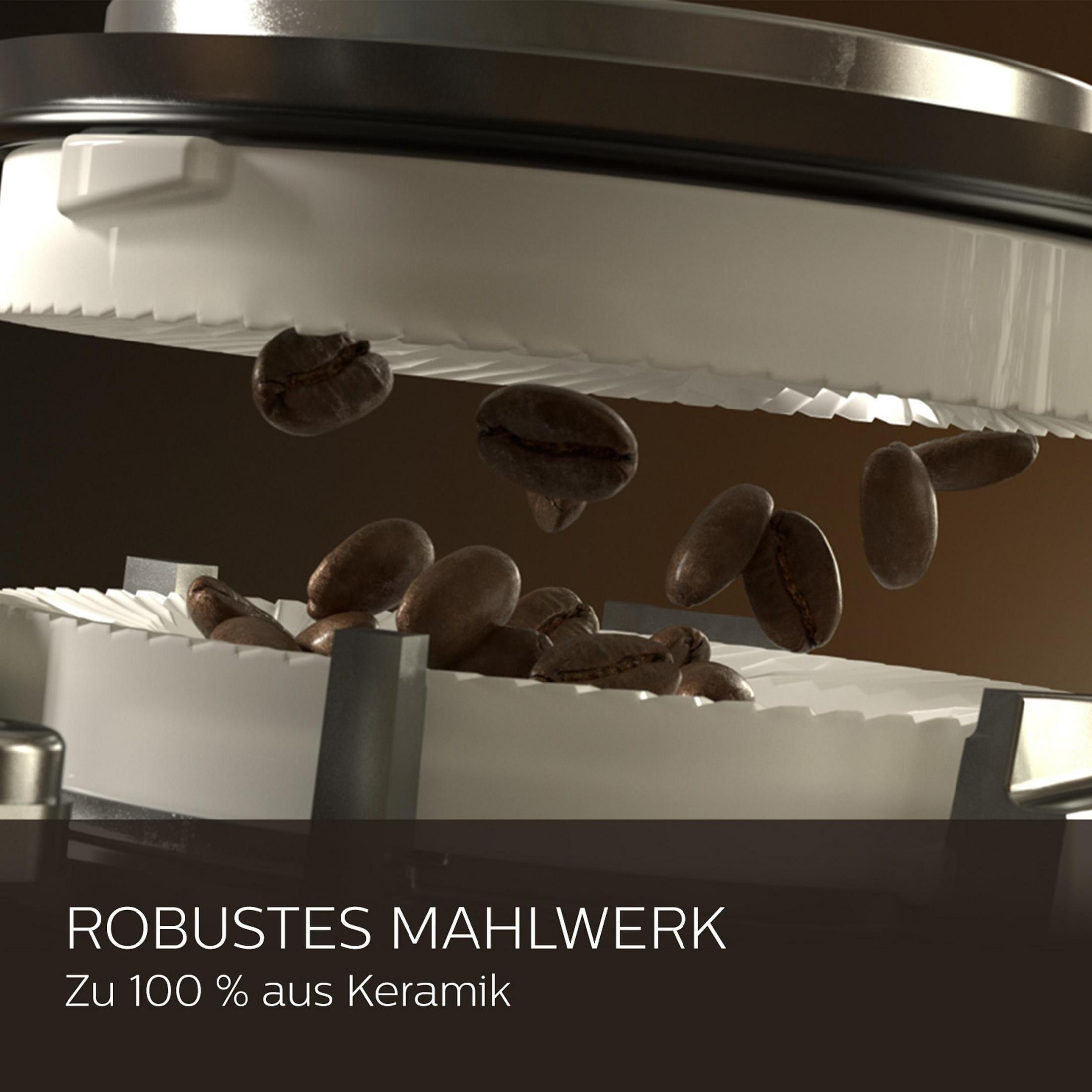 Nahaufnahme einer Kaffeemühle mit Keramikmahlscheiben und Kaffeebohnen.