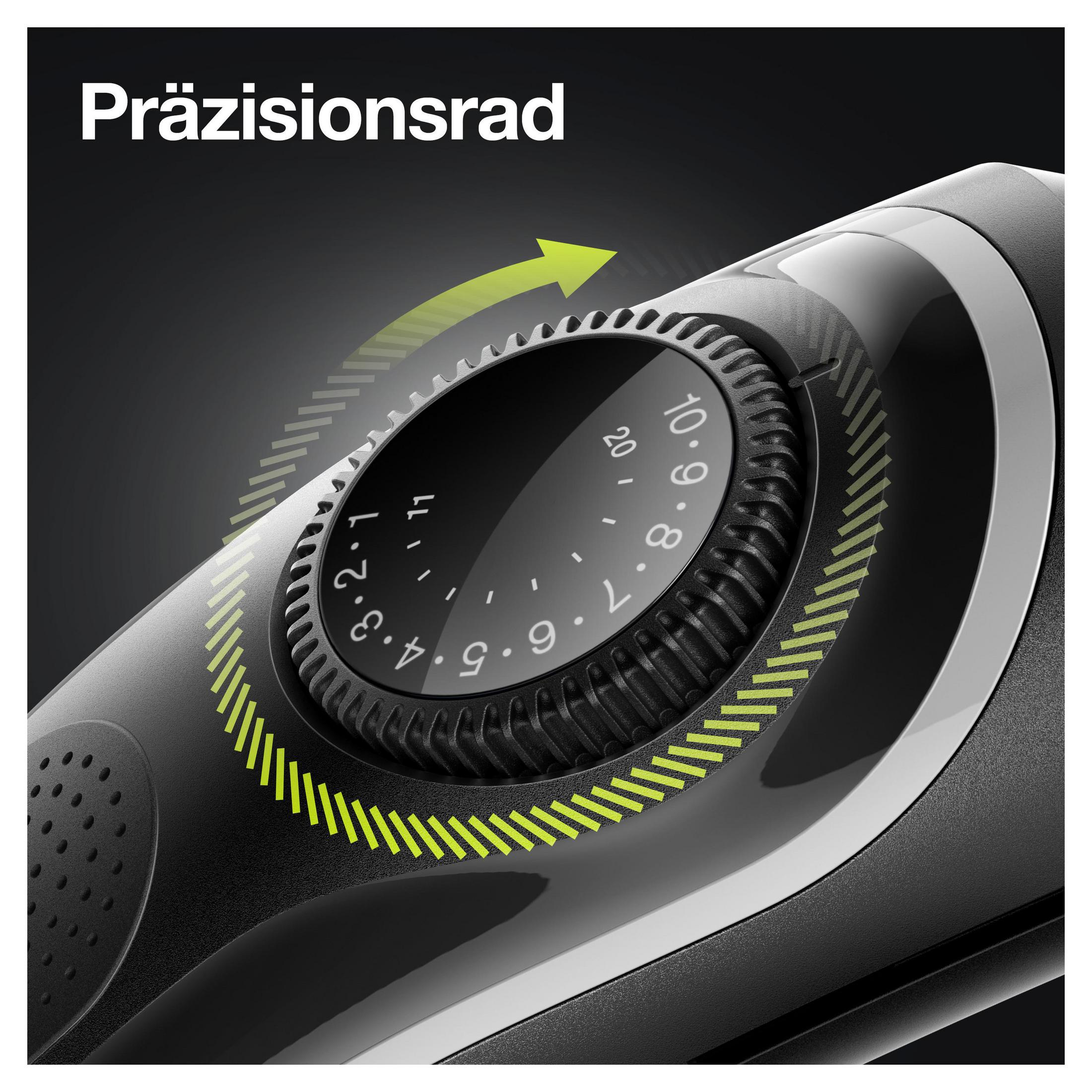 Primer plano de una afeitadora eléctrica negra y gris con dial de precisión y flecha verde.