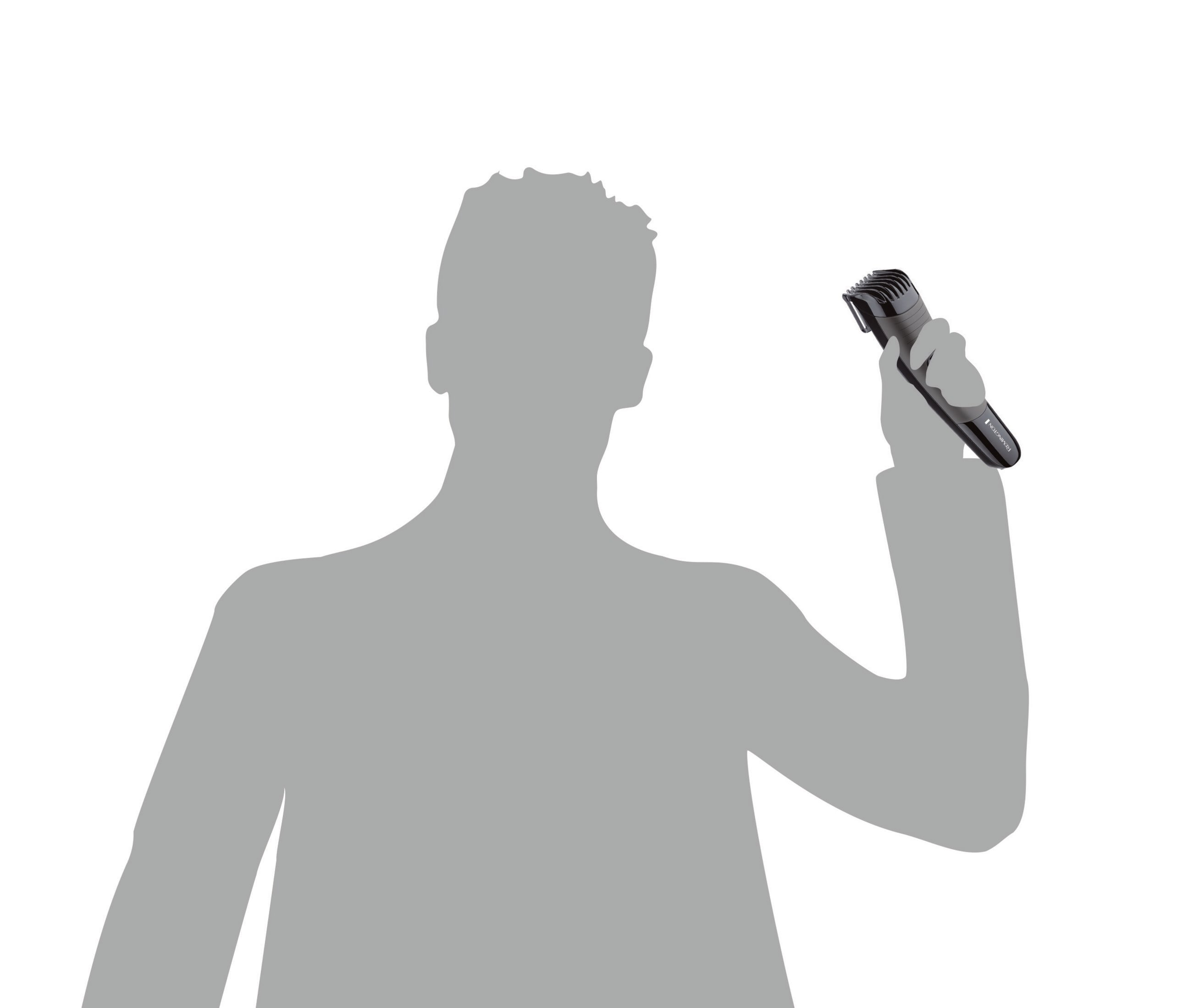 Silhouette di una persona che tiene un regolabarba nero e argento.
