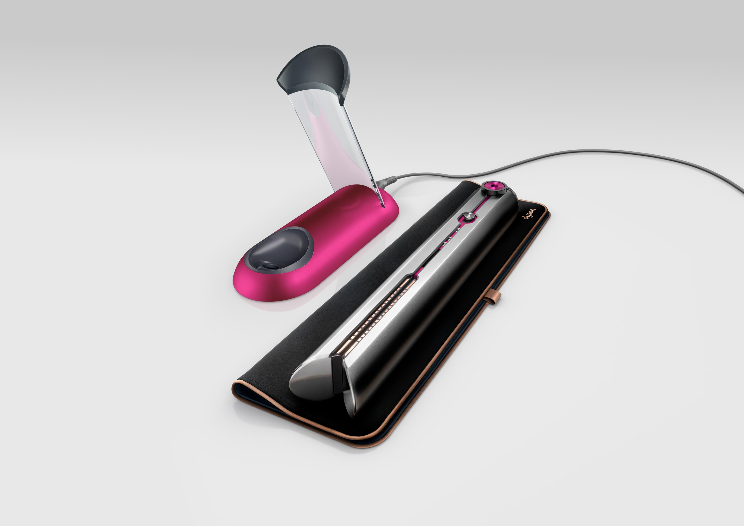 Metalowa, czarna zgrzewarka próżniowa na drewnianej powierzchni, z panelem sterowania.