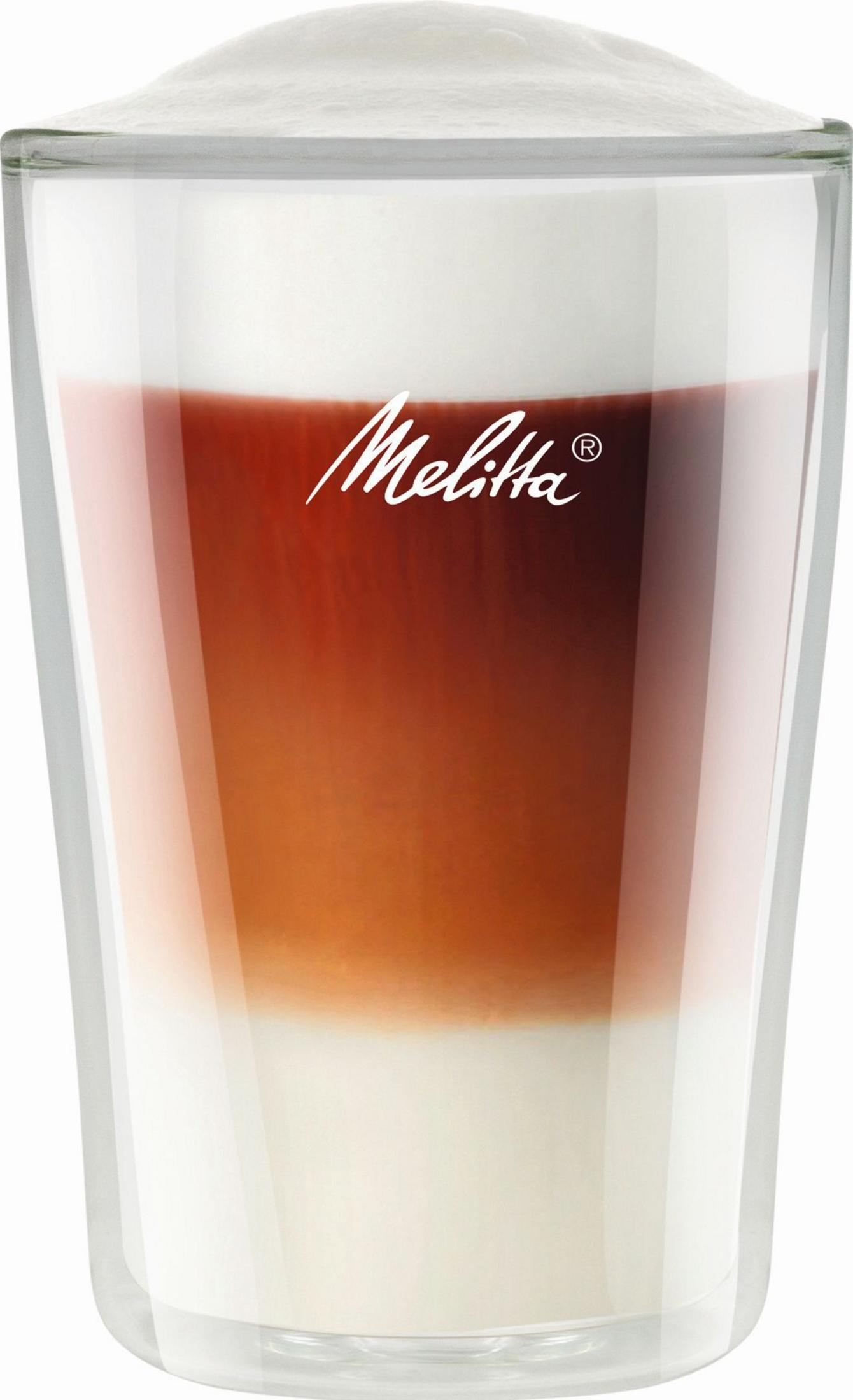 Glas mit geschichtetem Kaffeegetränk, weißer Schaum, braune und weiße Schichten.