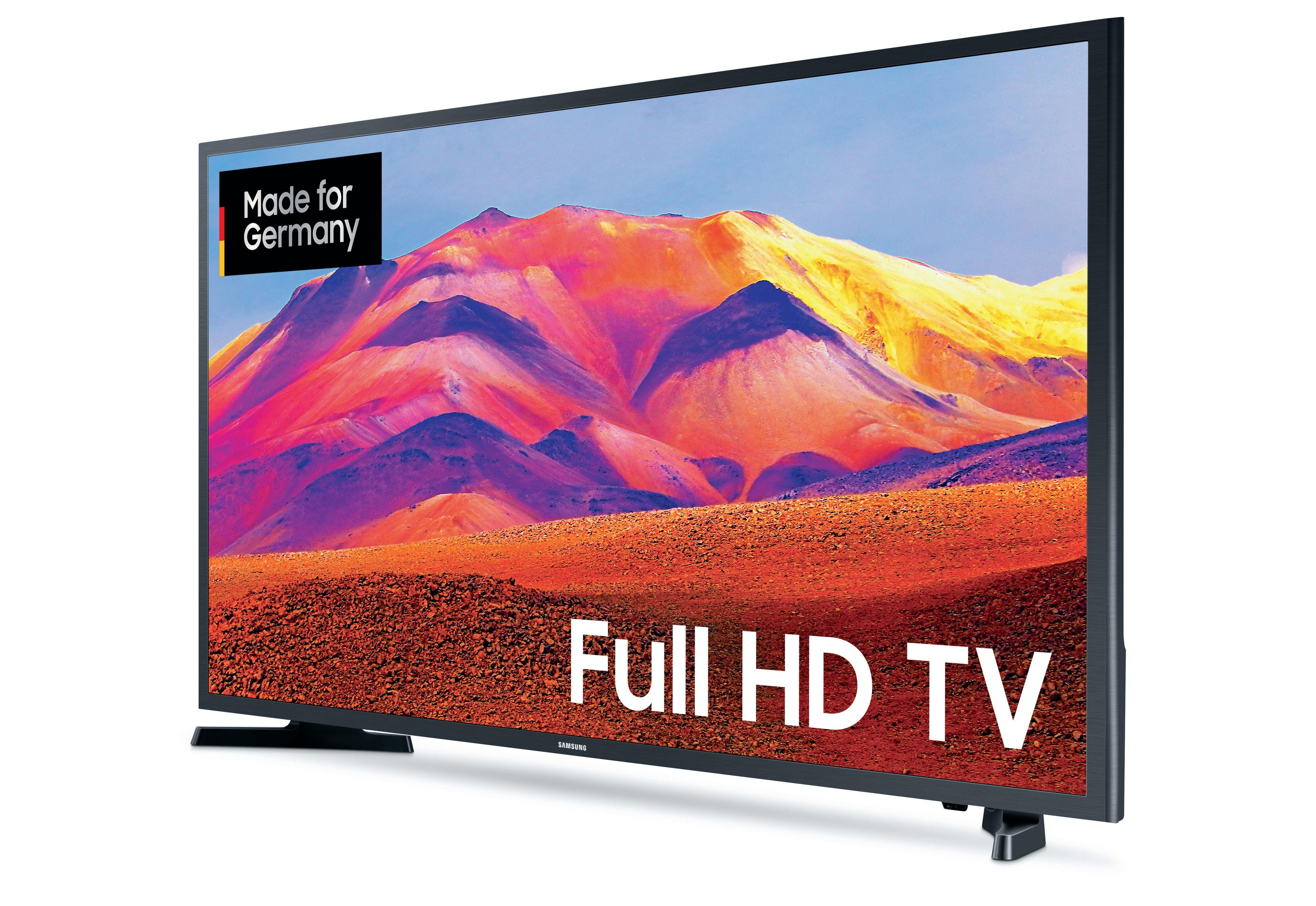 Telewizor z płaskim ekranem z kolorową sceną górską.