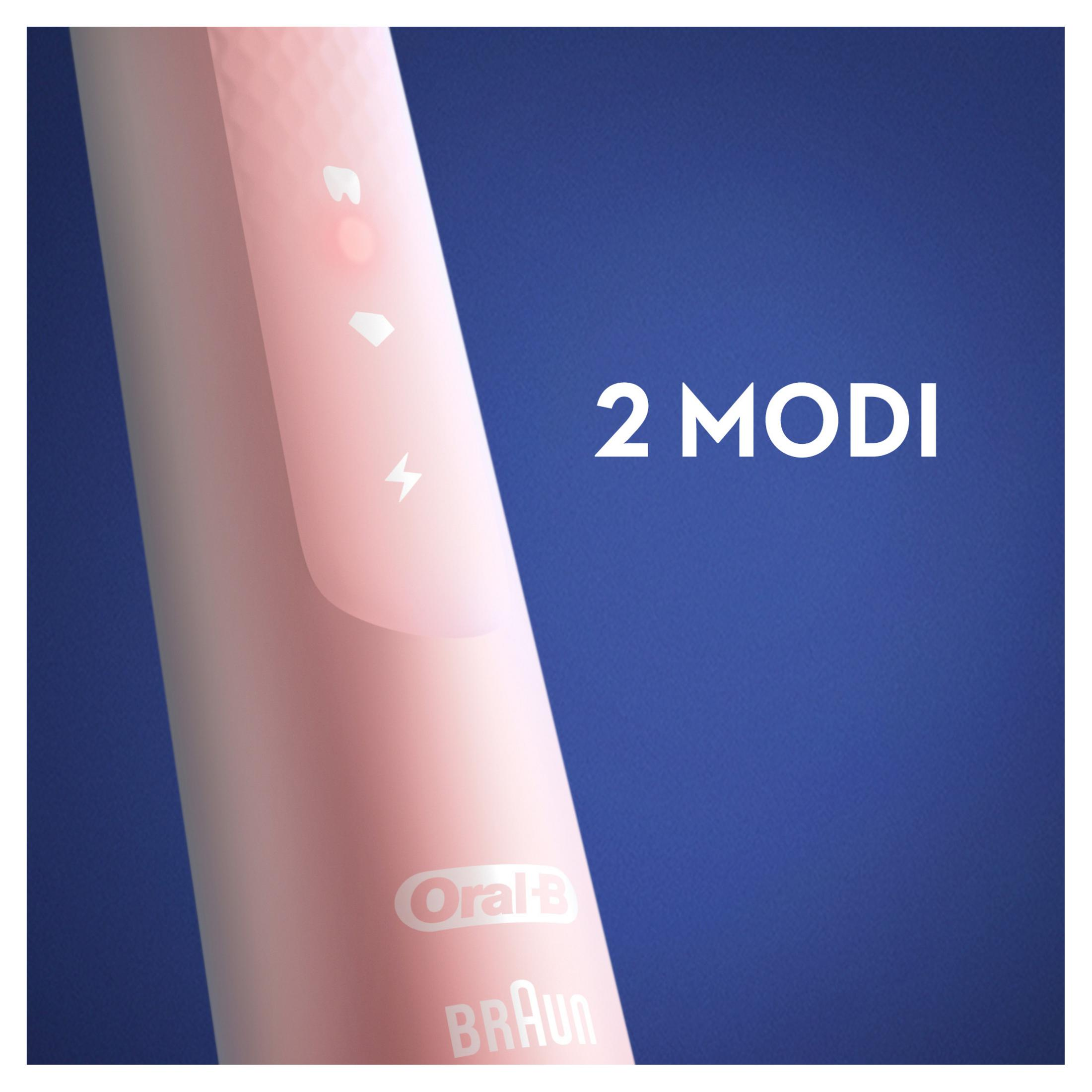 Cabezal de cepillo de dientes rosa con símbolos. Texto de dos modos sobre fondo azul.
