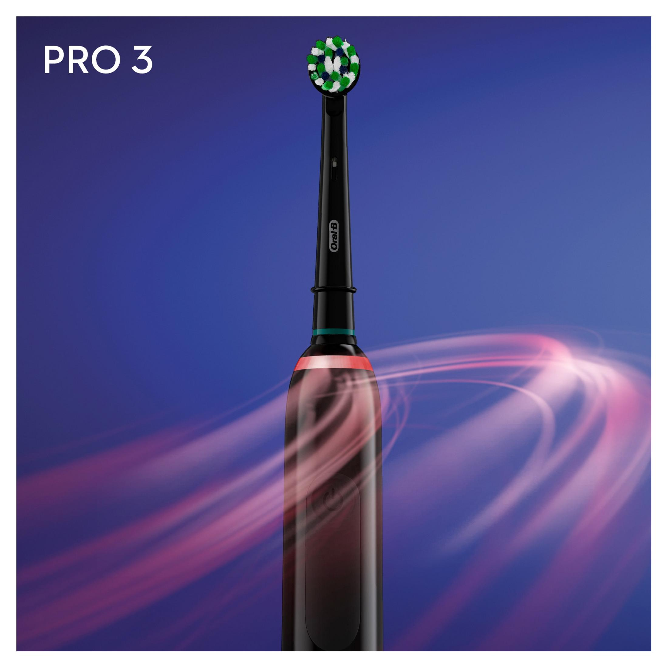 Cabezal de cepillo de dientes eléctrico negro y rojo. Fondo degradado azul y rosa.