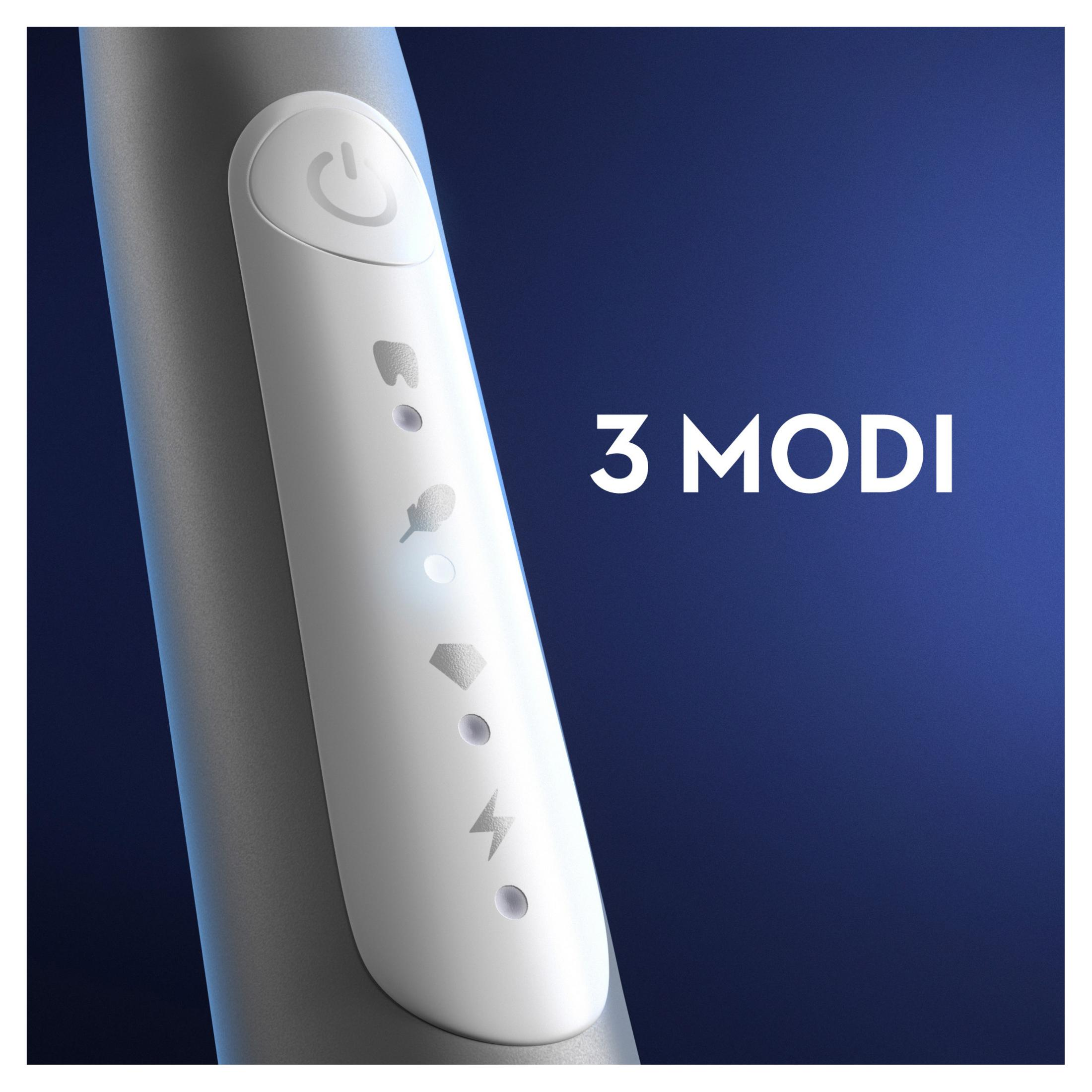 Zbliżenie szczoteczki do zębów ze wskazanymi trybami funkcji.