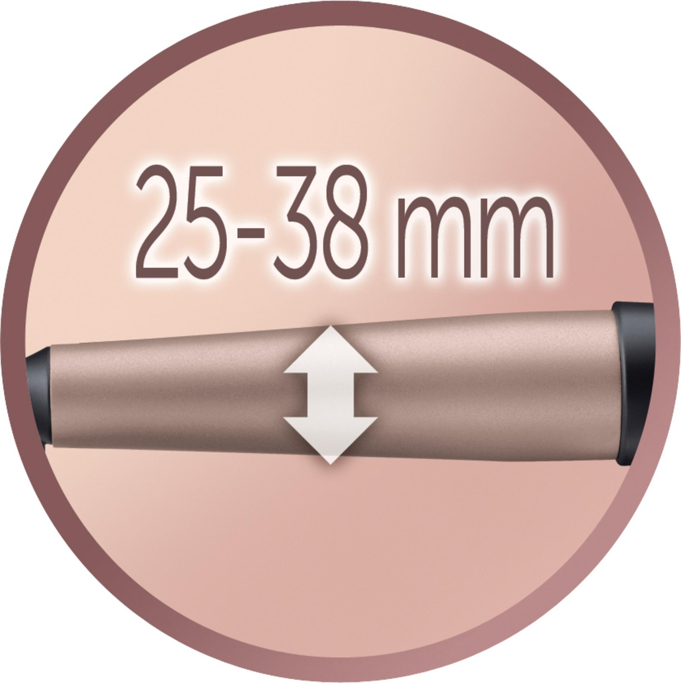 Zbliżenie na lufę lokówki ze strzałką wskazującą na pomiar.