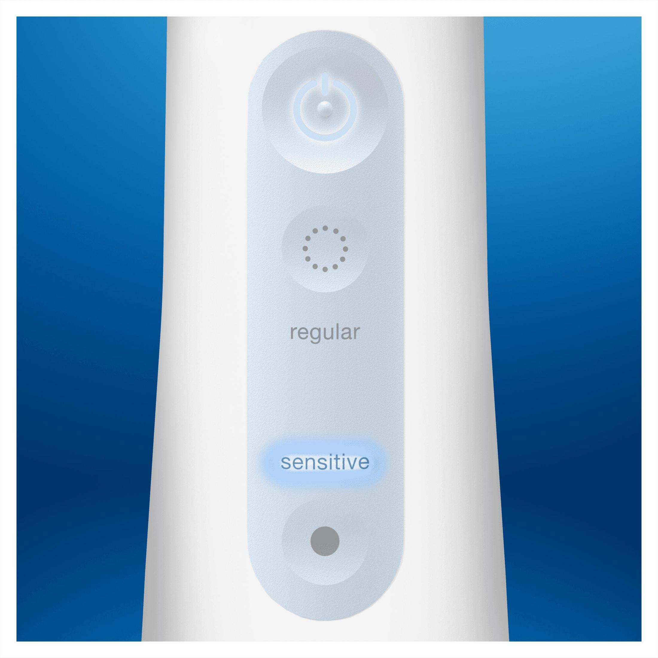 Primer plano del cabezal de un cepillo de dientes eléctrico. El panel muestra 'normal' y 'sensible'.