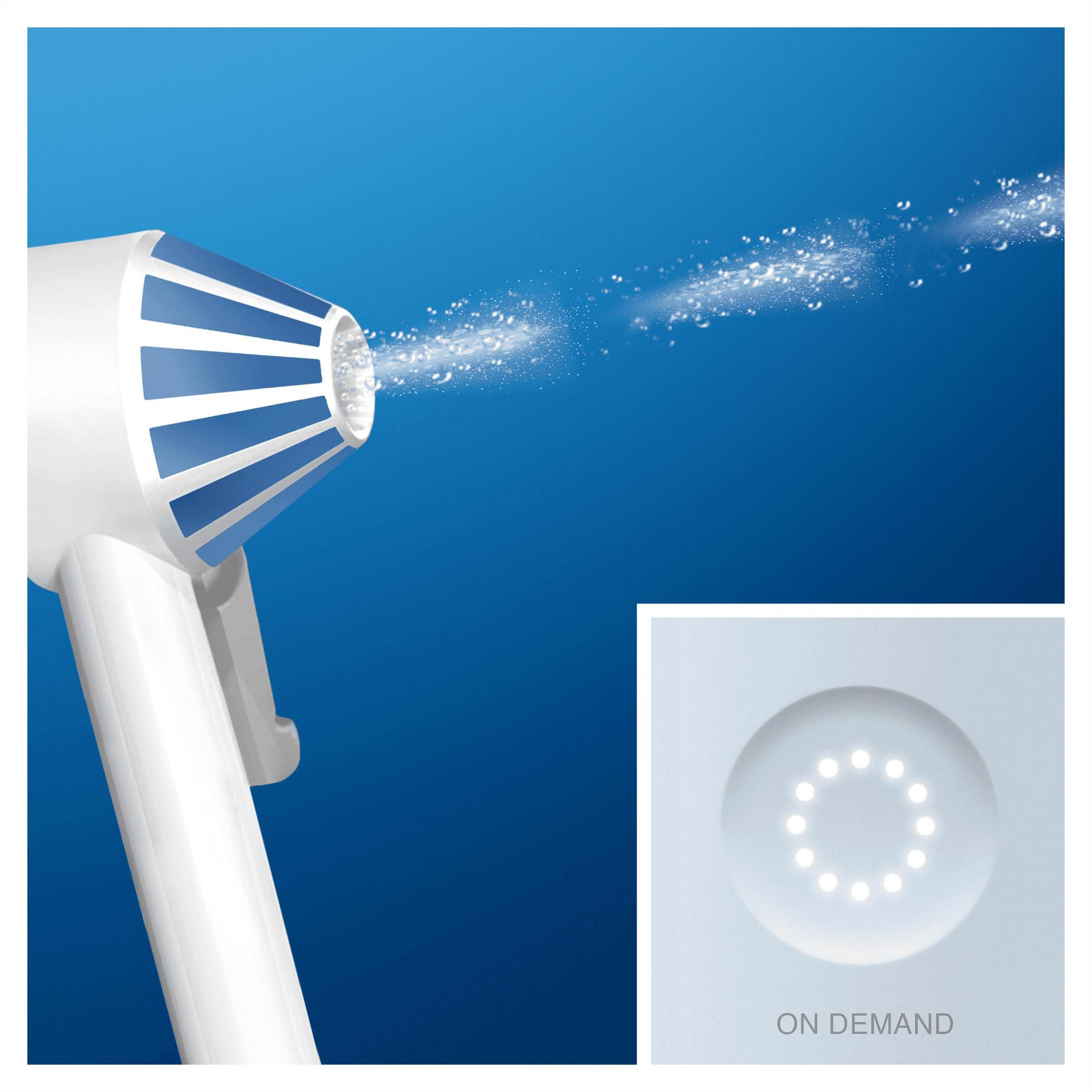 Un dispositivo blanco y azul rocía agua, con un panel separado con luces.