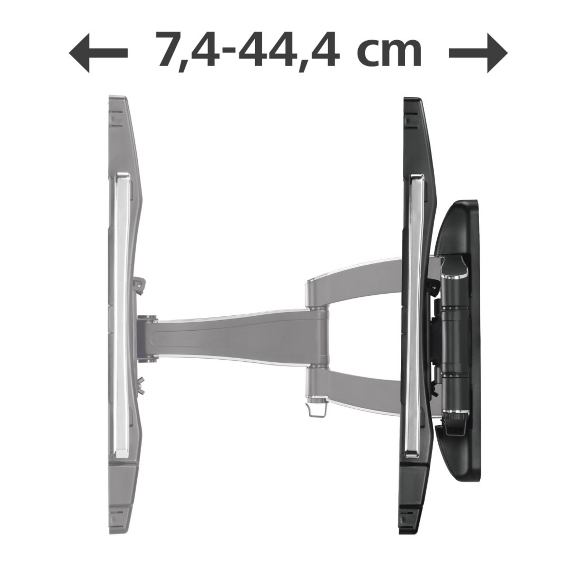 Un soporte de pared para TV. El soporte está extendido, mostrando un rango de movimiento de 7,4 a 44,4 cm.