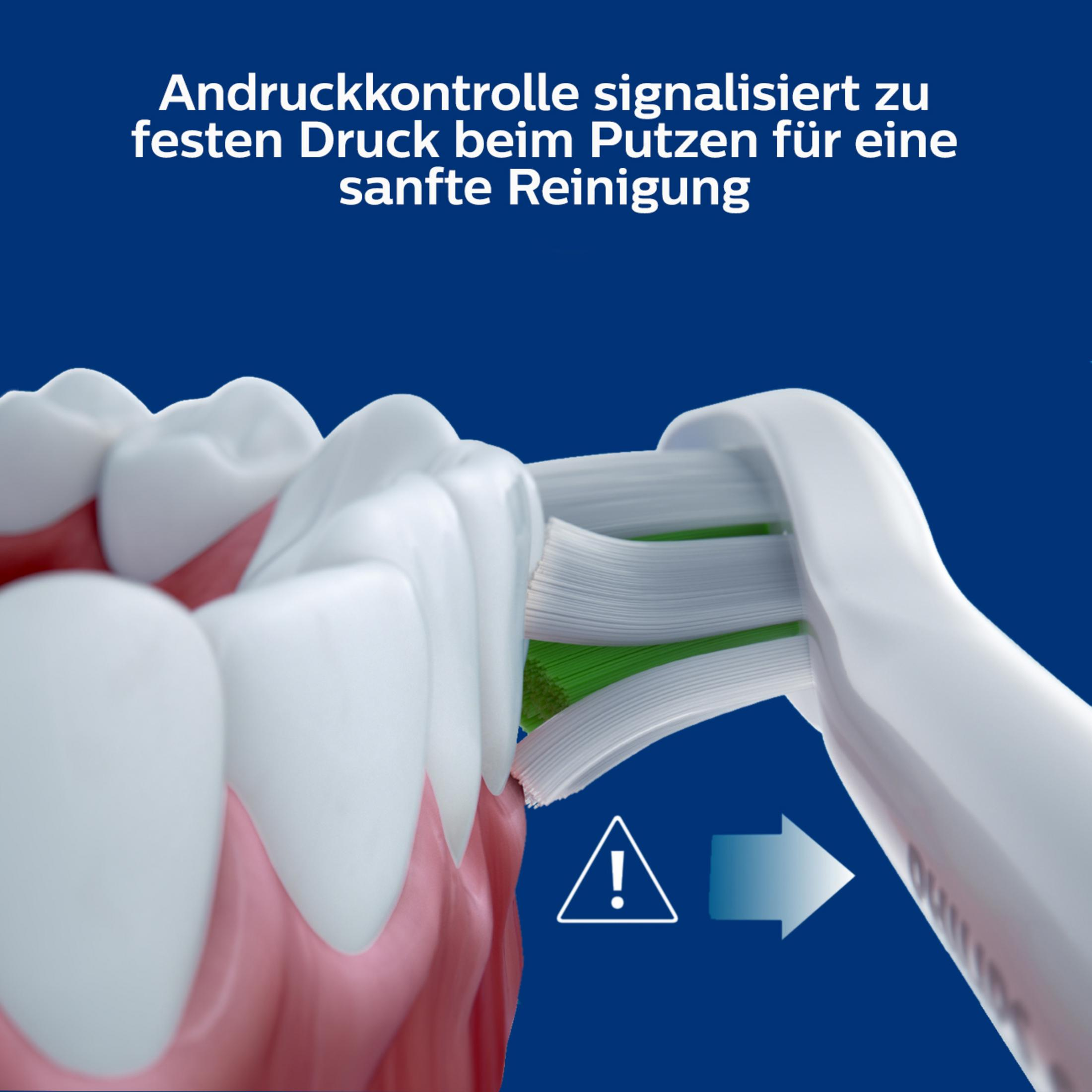 Zahnbürste putzt Zähne. Text: Druckkontrolle signalisiert für sanfte Reinigung.