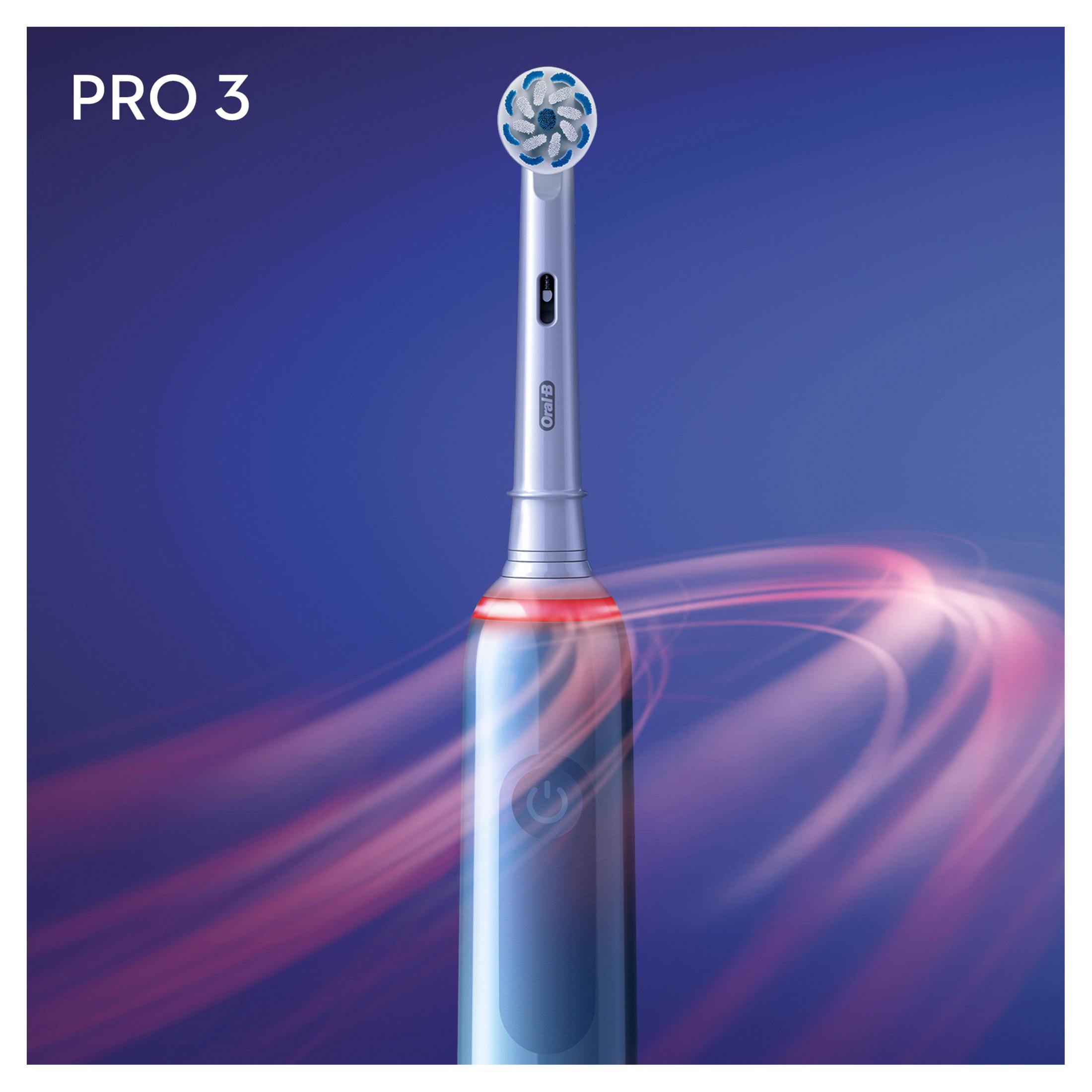 Spazzolino elettrico con setole blu e bianche e pulsante di accensione con luce.