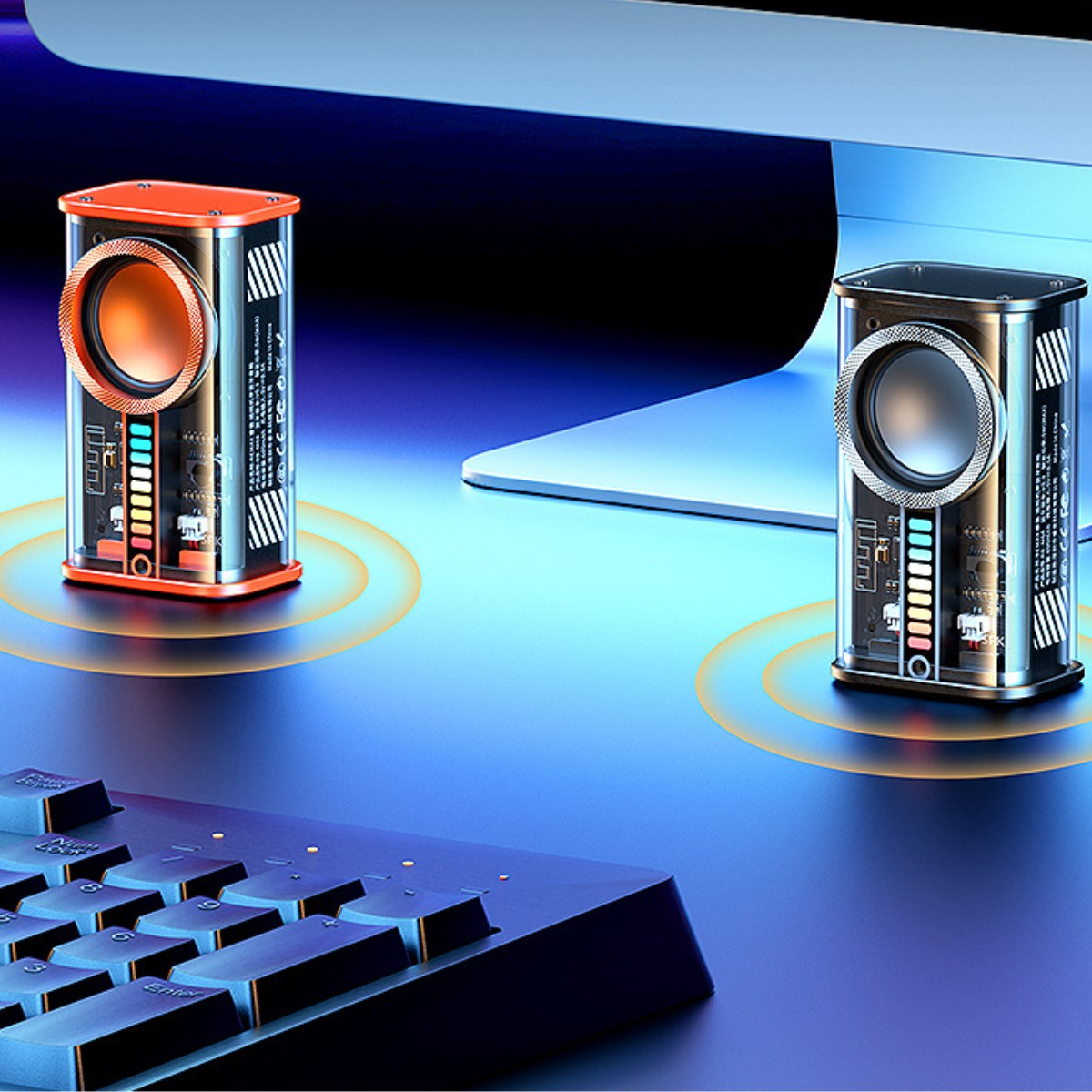 Zwei futuristische Lautsprecher, orange und silber, neben einer Tastatur und einem Monitor, leuchtendes Ambiente.