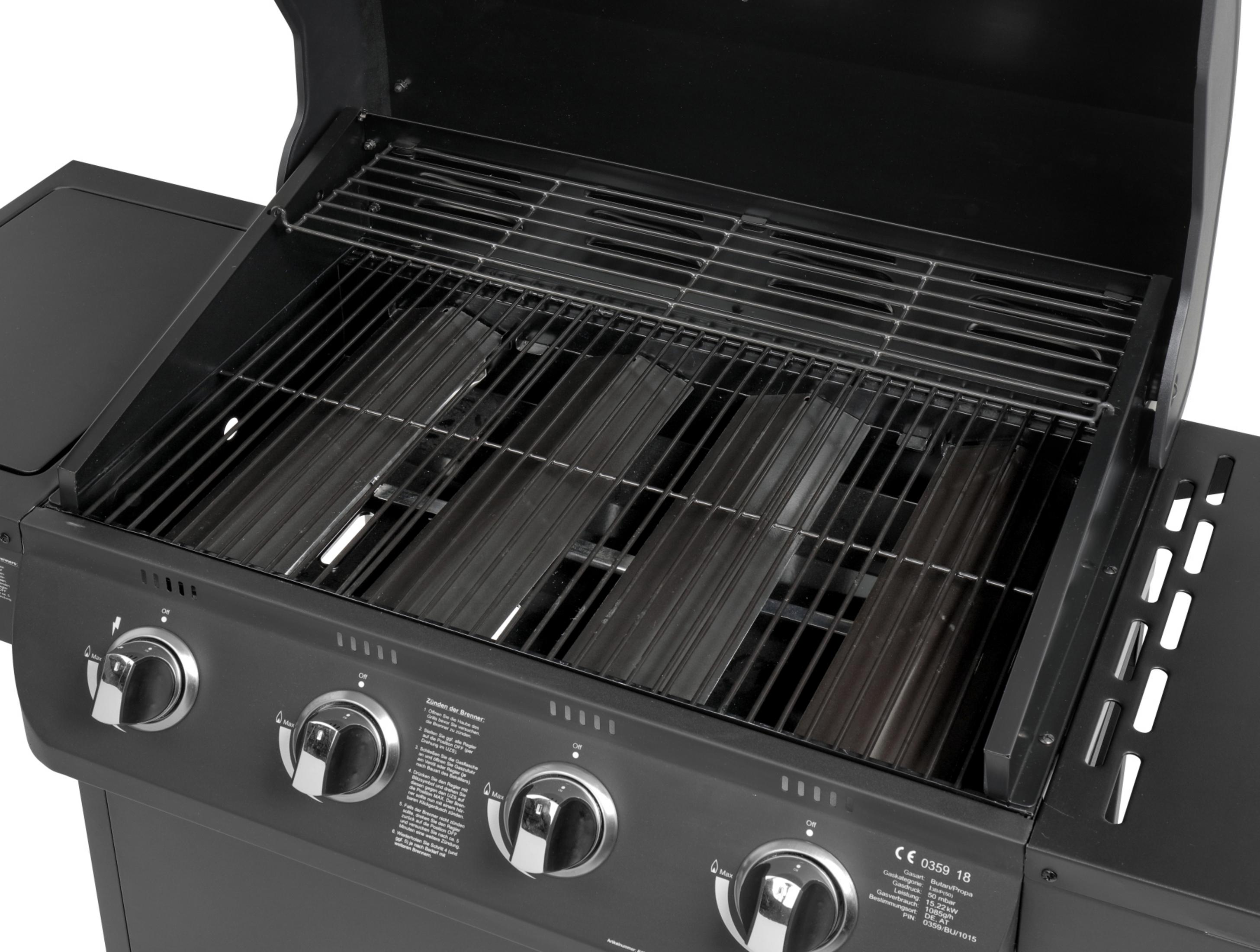 Ein offener Grill mit sichtbaren Brennern und Rosten, Nahaufnahme.