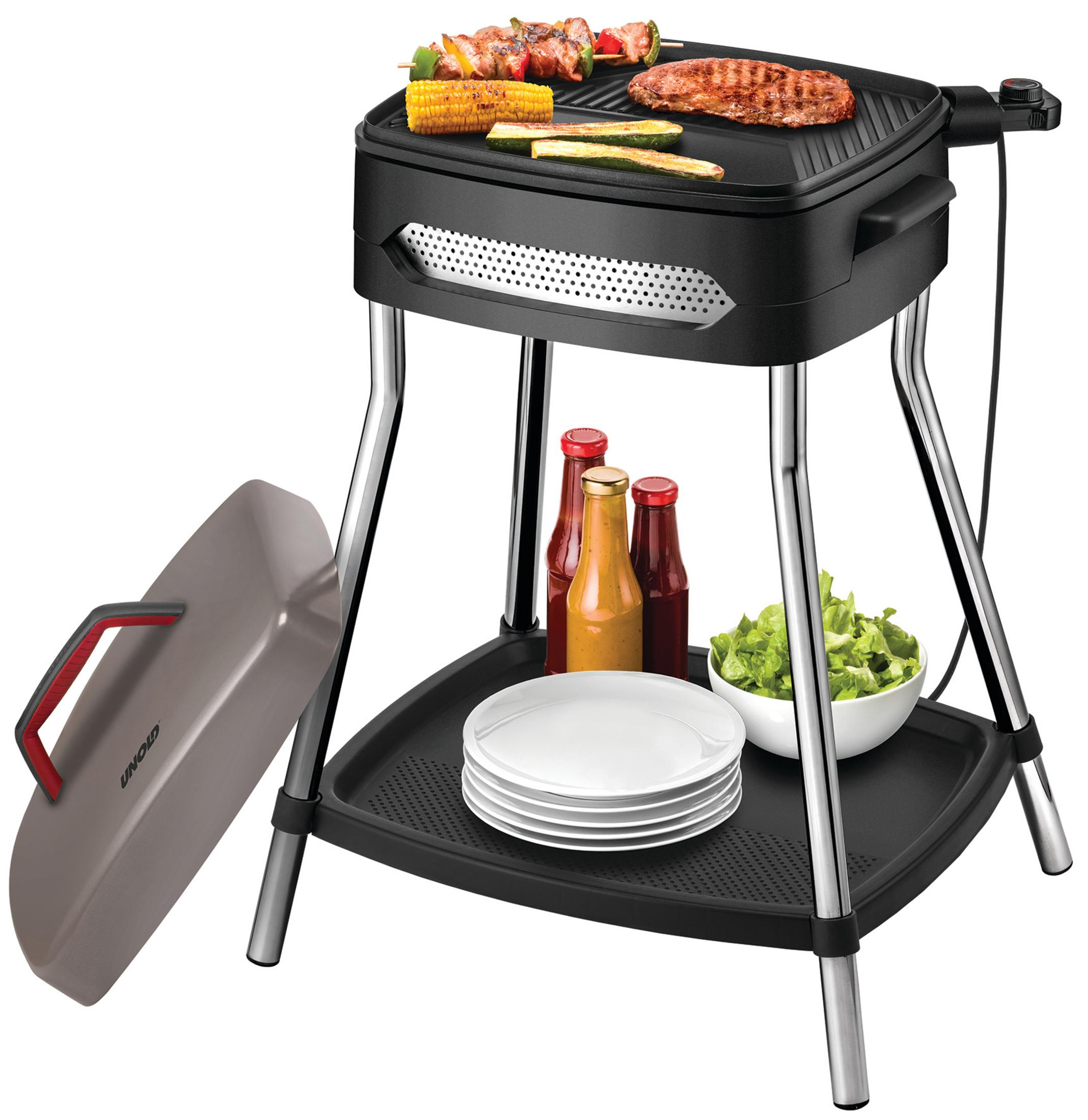 Outdoor-Grill mit Essen und Gewürzen. Schwarzer Grill mit Edelstahlbeinen, Essen oben drauf.