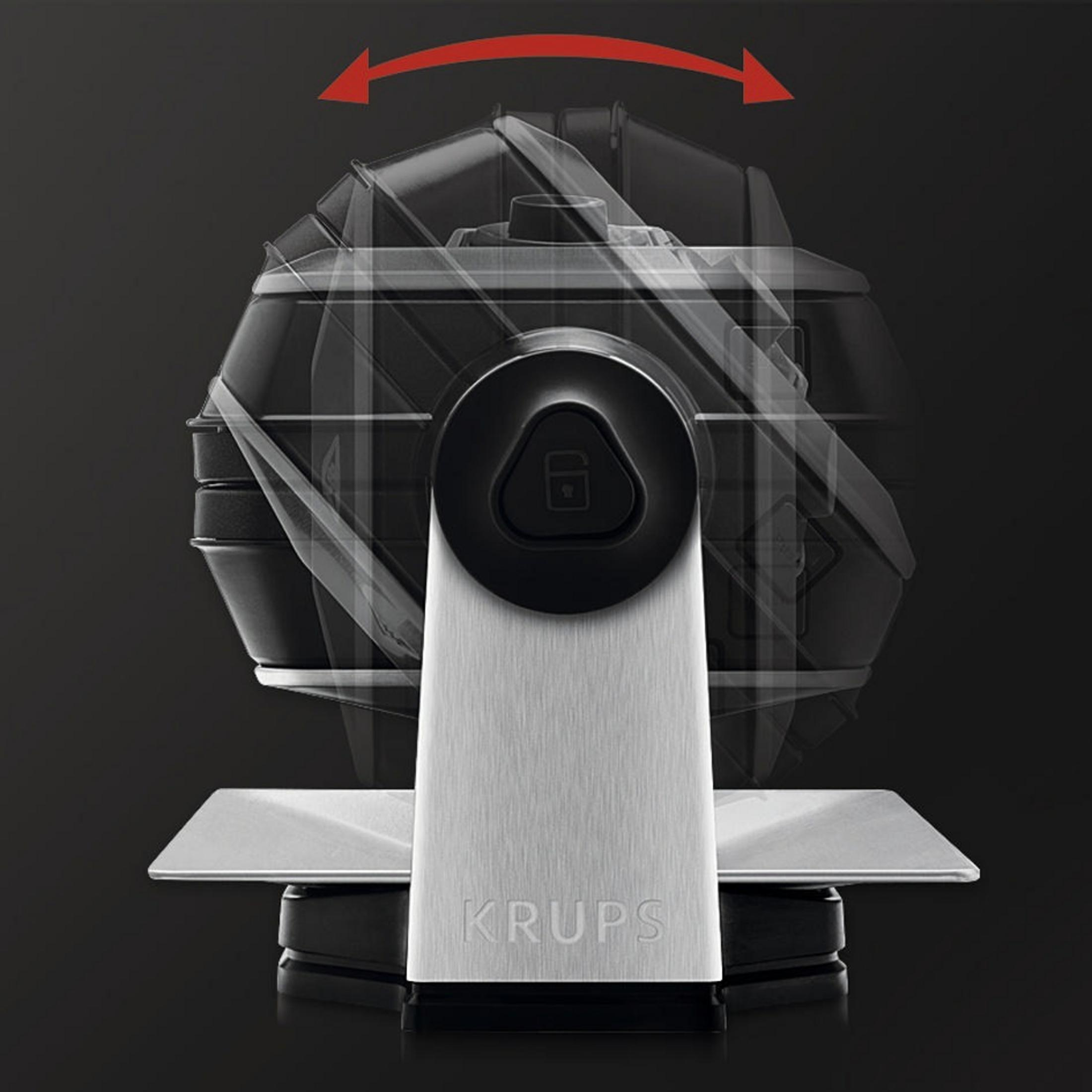 Ekspres do kawy Krups, obracany widok ze strzałkami, czarne tło.