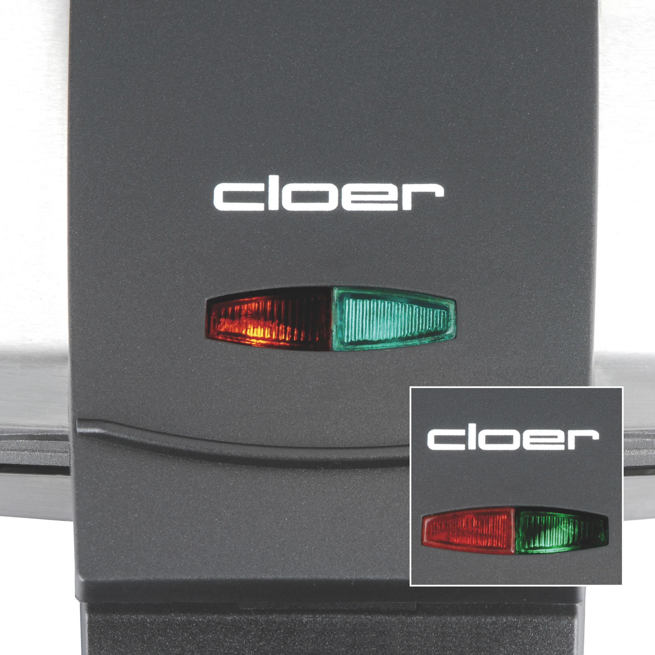 Schwarzes Cloer-Gerät mit roten und grünen Lichtern. Weißer Hintergrund.