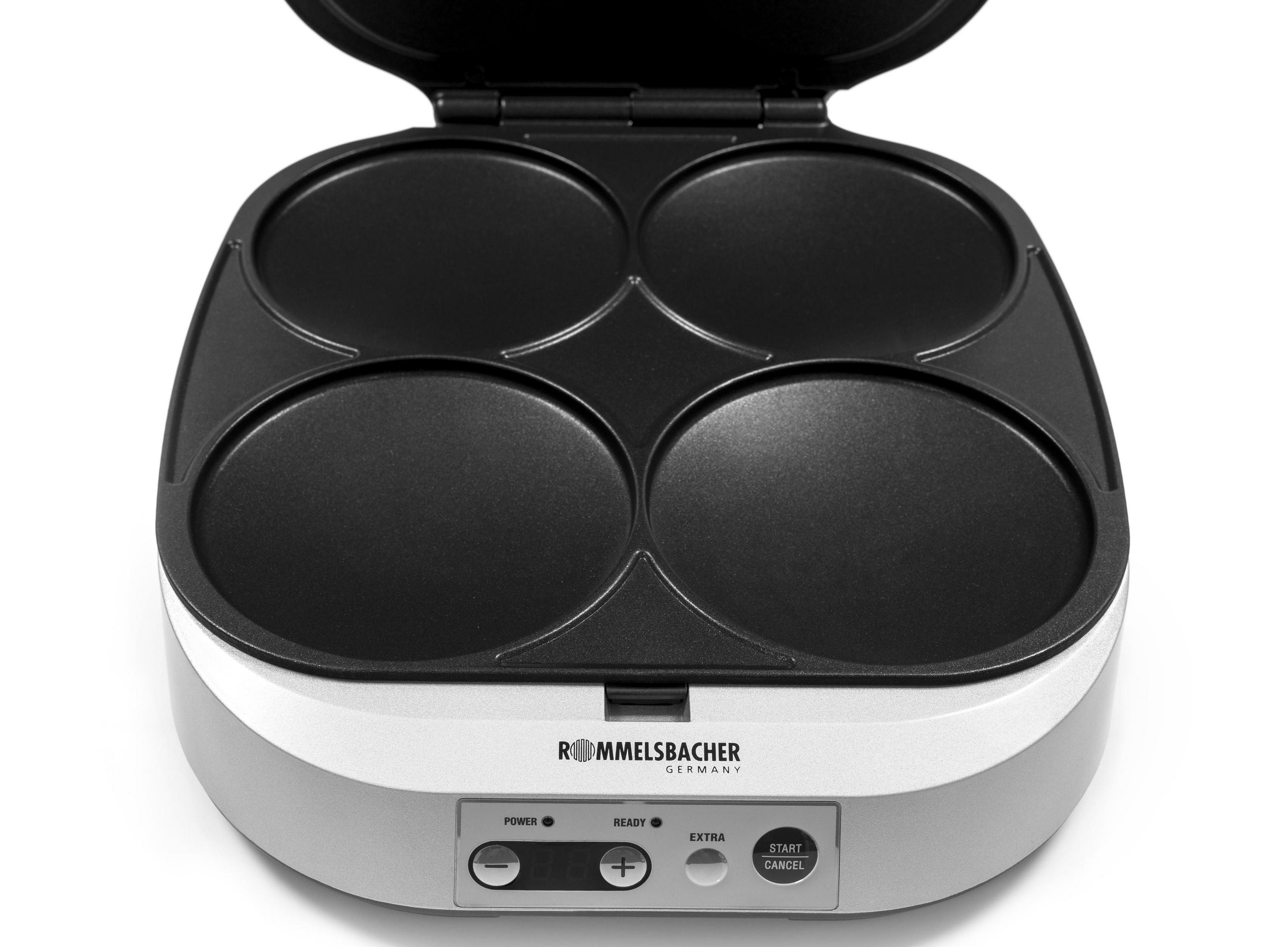 Maszynka do naleśników z czterema okrągłymi polami do gotowania, otwarta i gotowa.