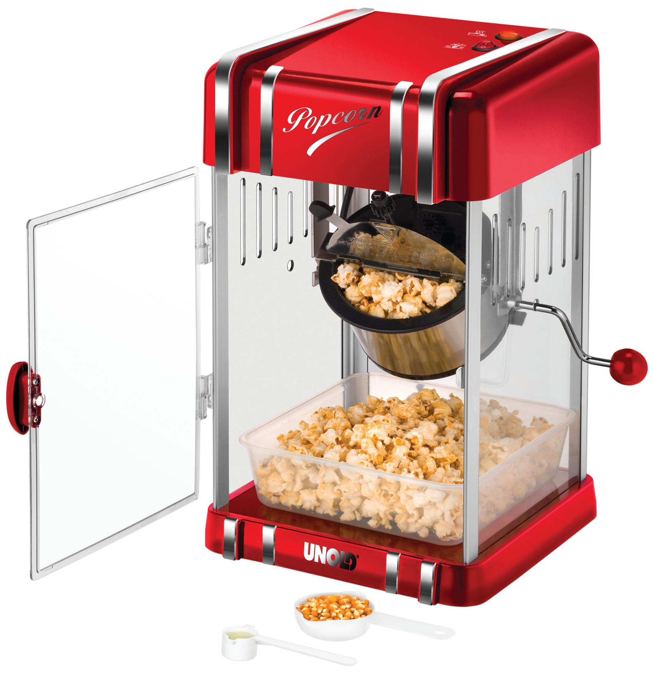 Eine rote Retro-Popcornmaschine mit transparenter Tür, gefüllt mit Popcorn und Maiskörnern.
