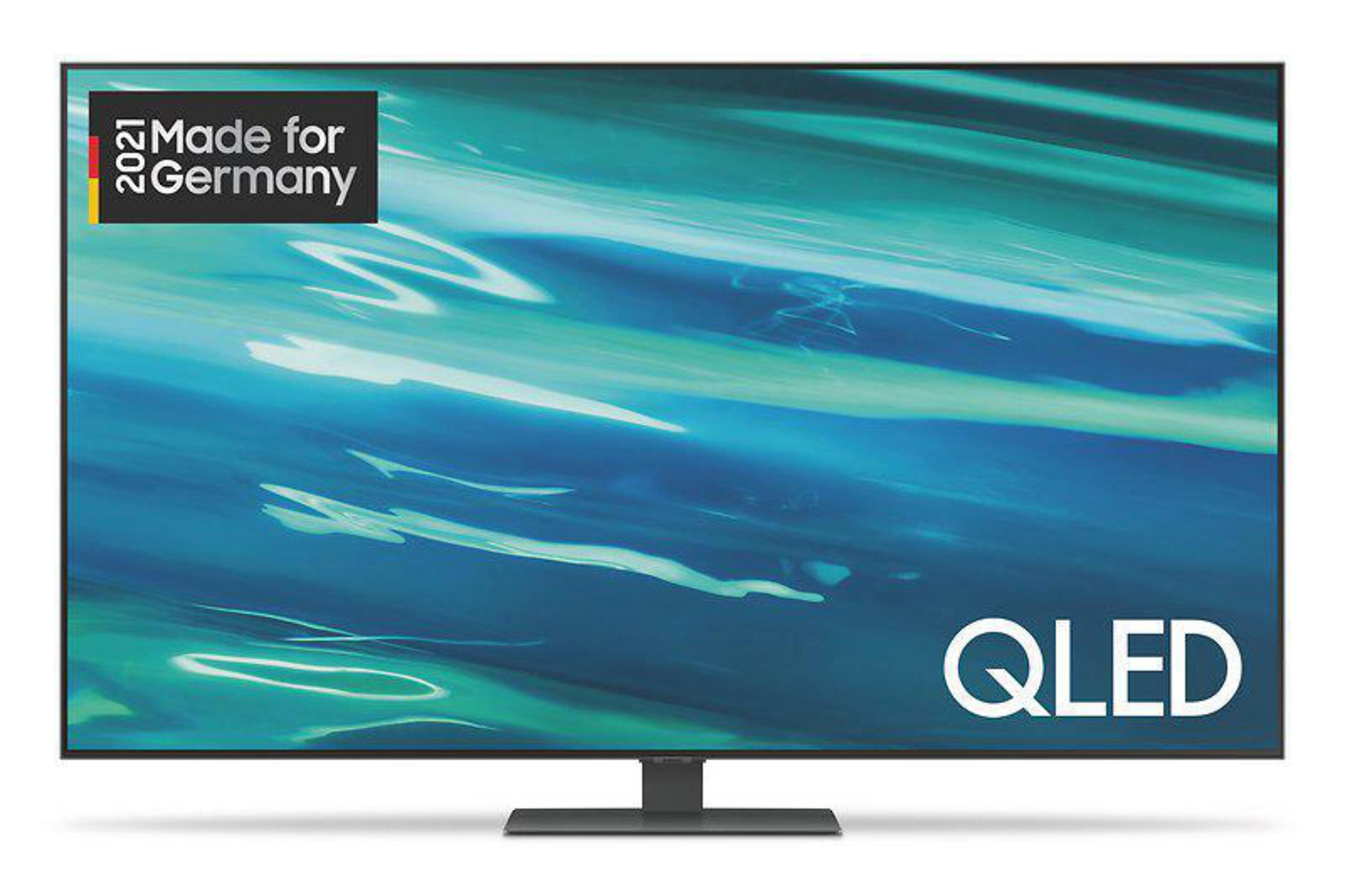 Moderner QLED-Fernseher mit schwarzem Standfuß, zeigt ein lebendiges, abstraktes blau-grünes Design.