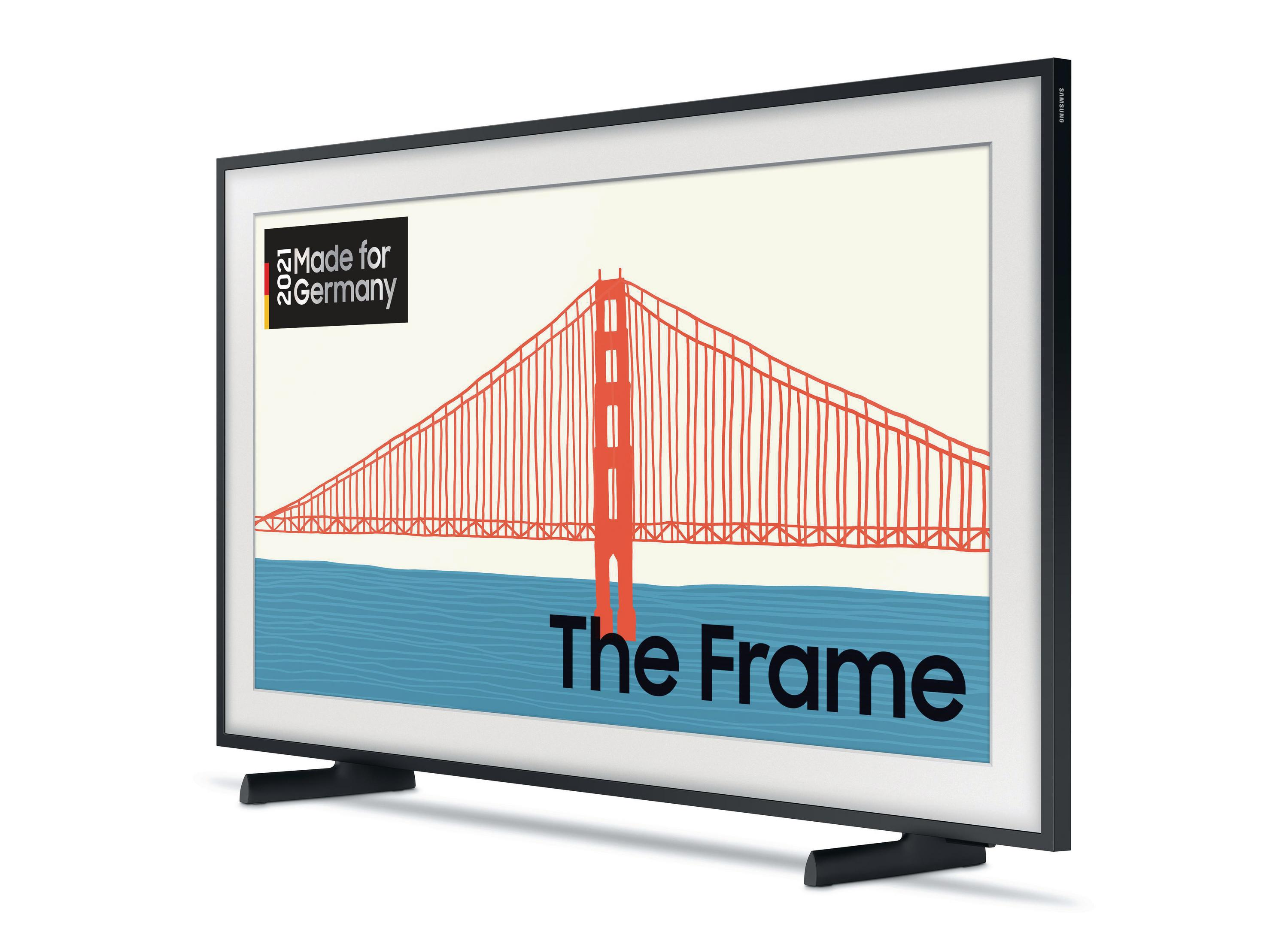 Czarny telewizor w ramce wyświetla obraz mostu z napisem 'The Frame'. Tło jest białe.