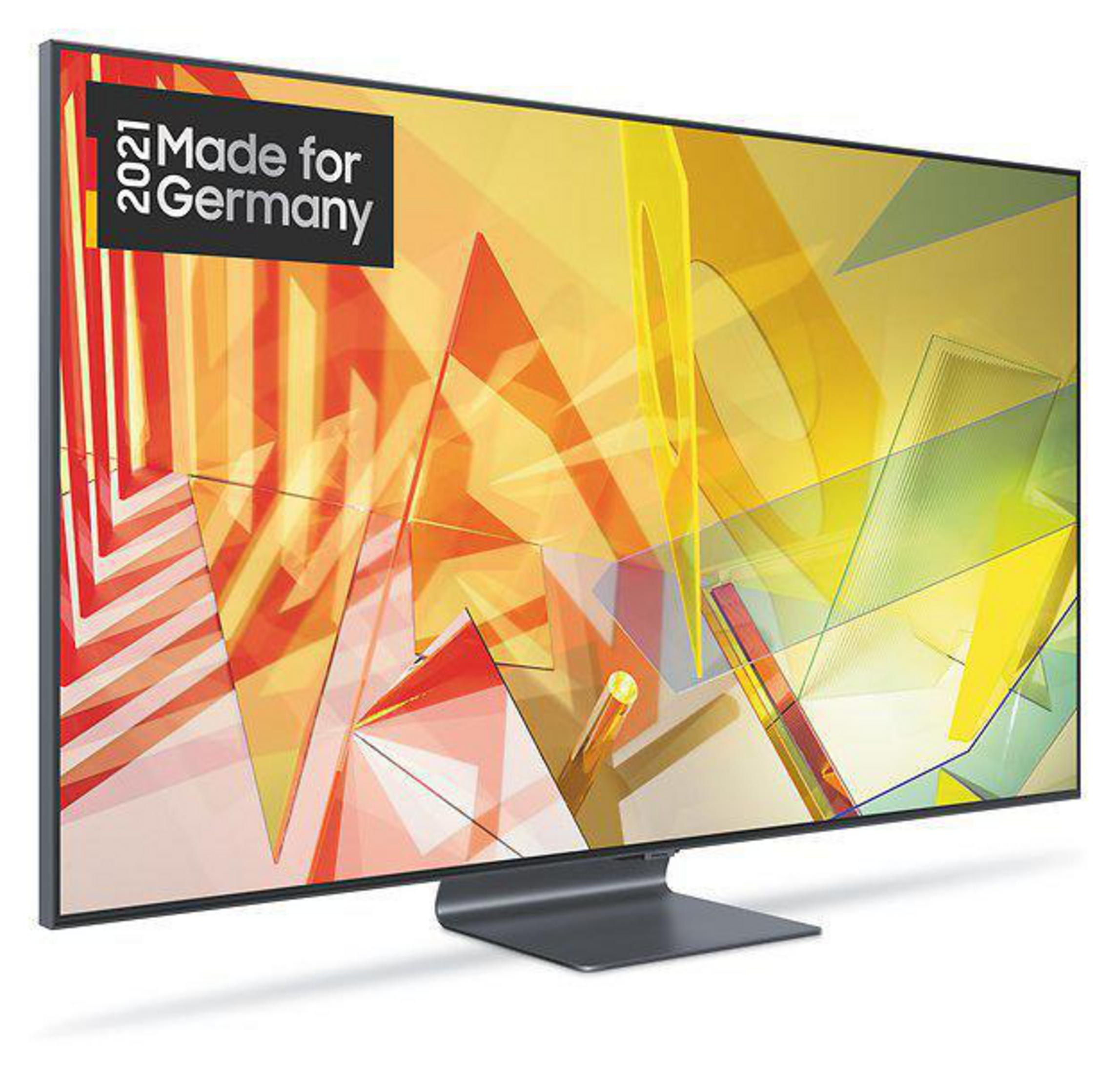 Duży ekran telewizora z napisem "Made for Germany 2021" i kolorowym abstrakcyjnym wzorem.