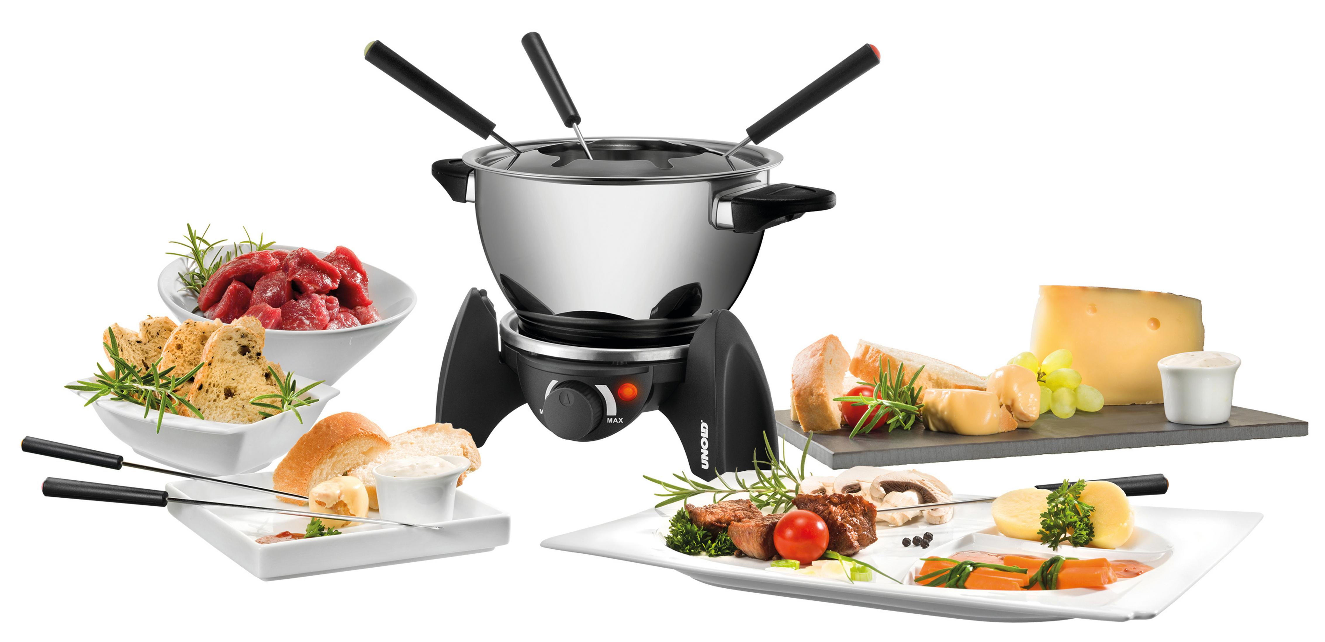 Zestaw do fondue z jedzeniem, mięsem, chlebem, serem i warzywami.