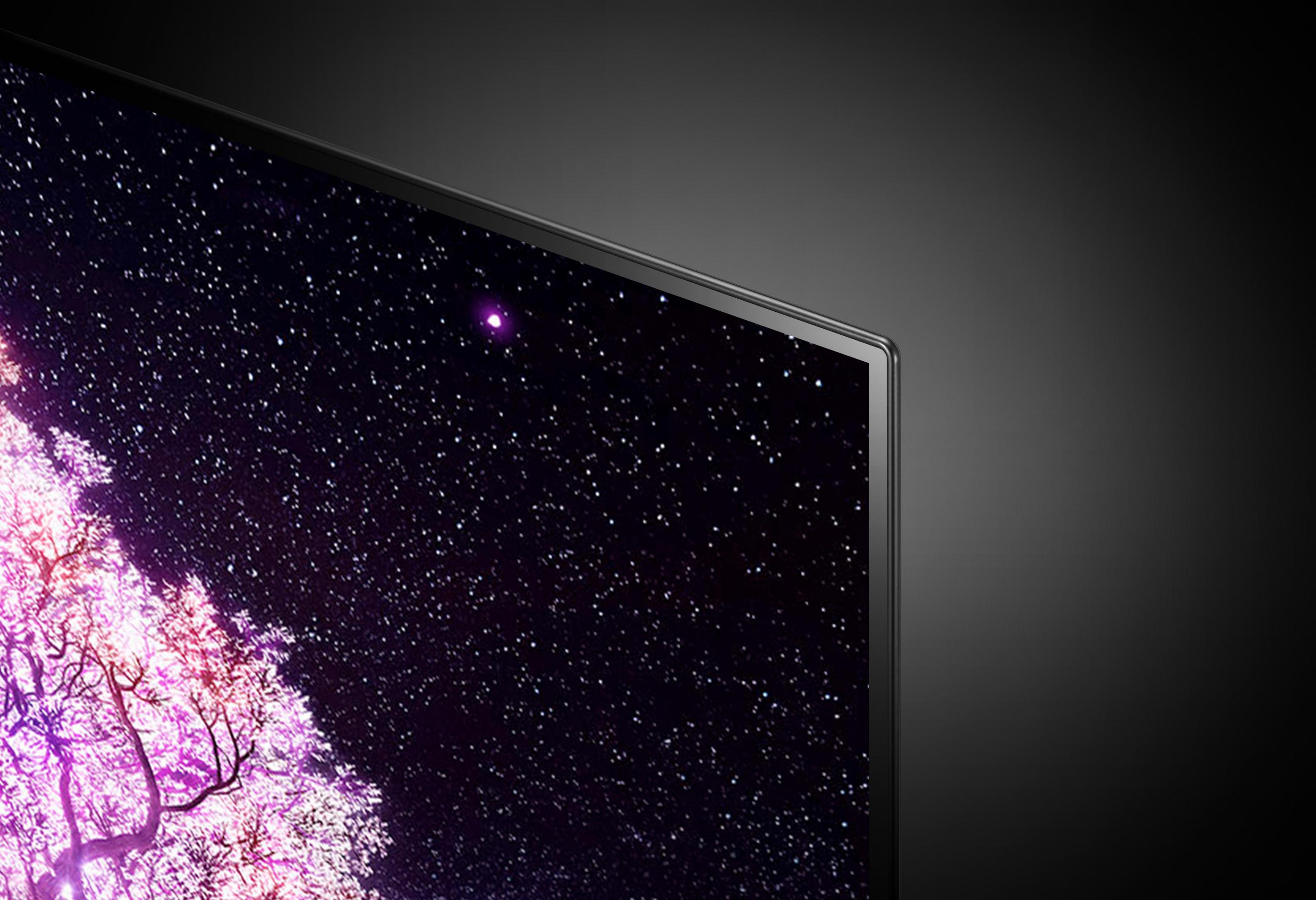 Nahaufnahme eines Fernsehbildschirms. Ein Sternenhimmel und Kirschblüten sind zu sehen.