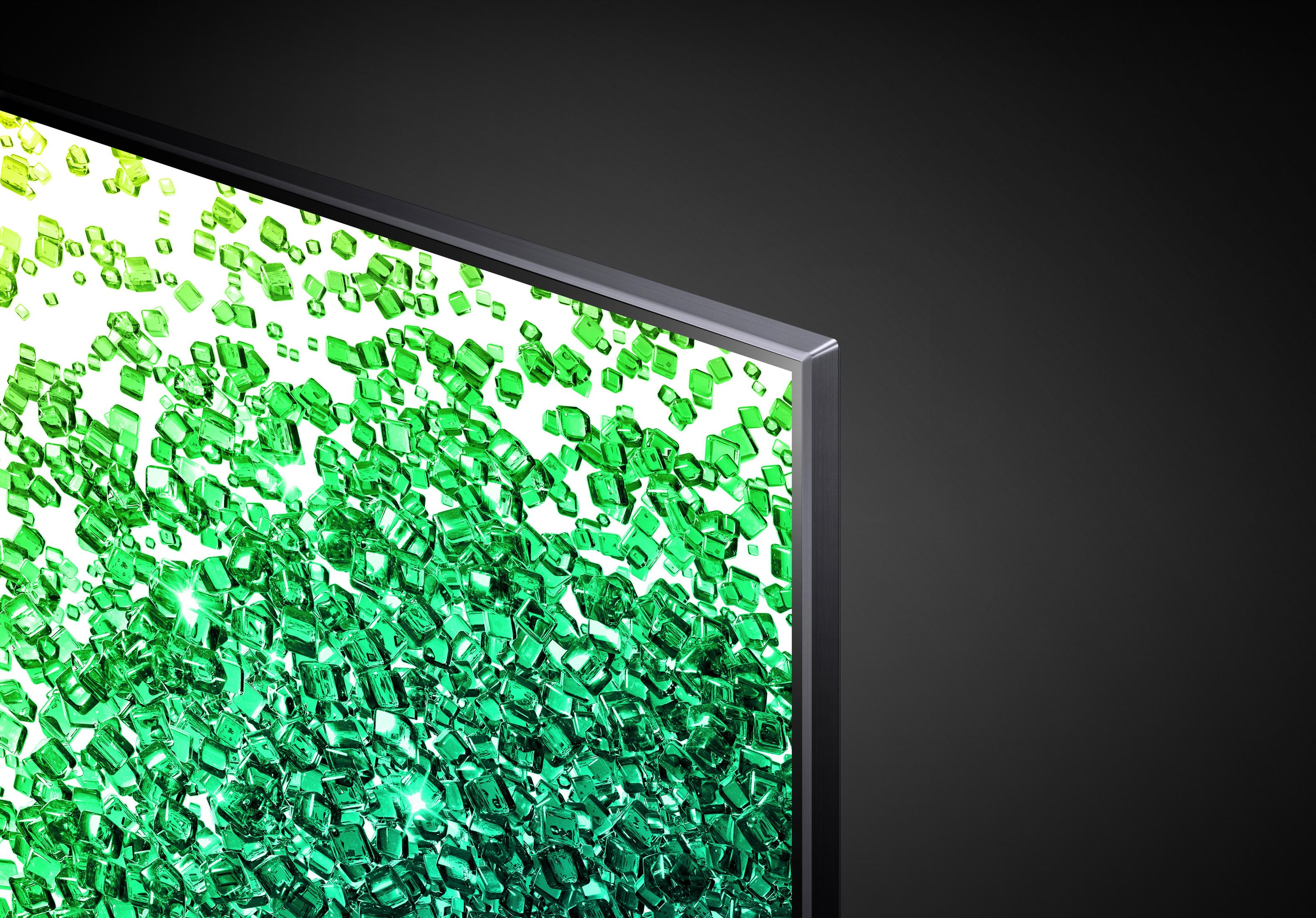 Zbliżenie rogu telewizora z zielonymi i żółtymi pikselowanymi kolorami na ekranie.