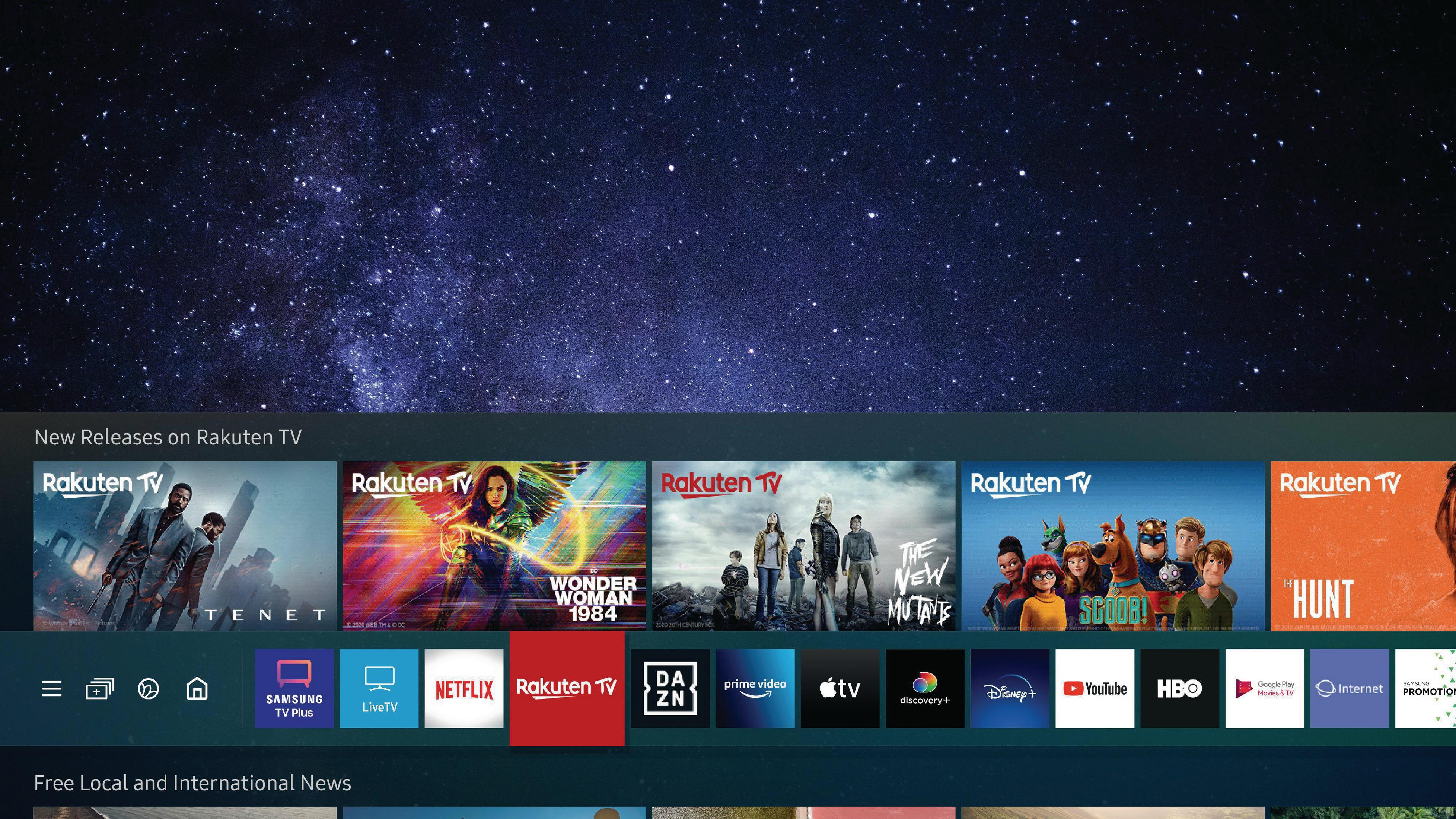 Telewizor wyświetlający interfejs Rakuten TV z wyborami filmów na tle gwiezdnym.