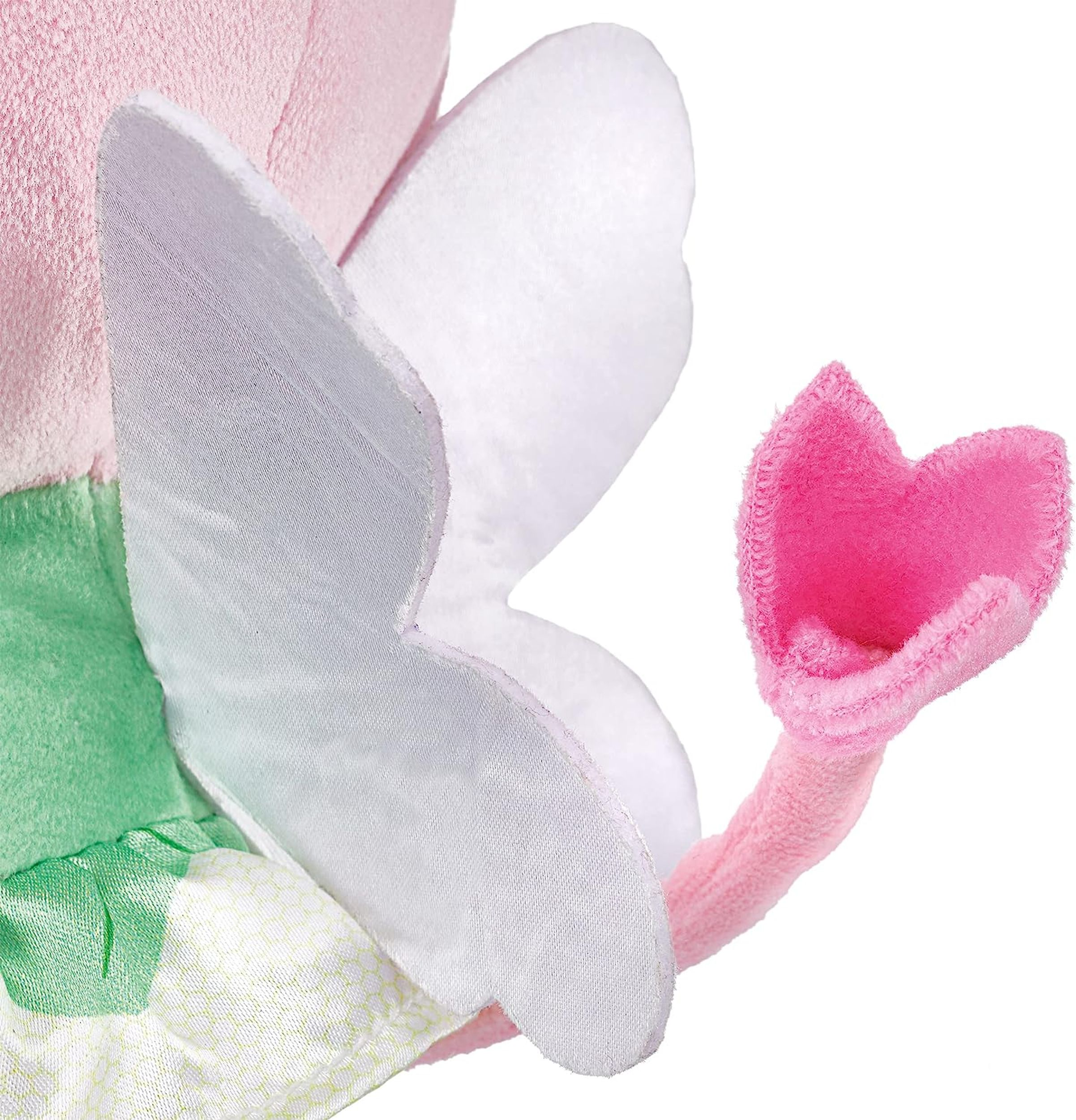 Zbliżenie pluszowej zabawki ze skrzydłami i główką w kształcie kwiatu.