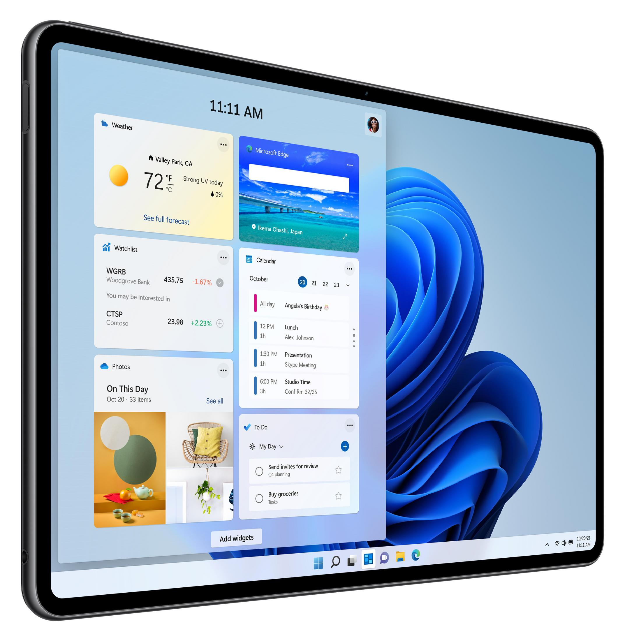 Une tablette affichant une interface Windows 11 avec des widgets. La tablette est noire avec un grand écran.