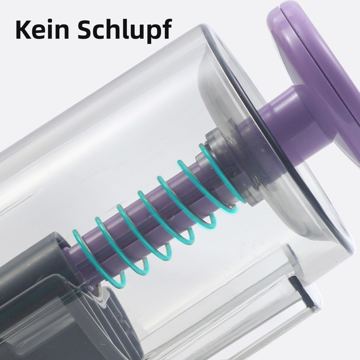 Nahaufnahme eines durchsichtigen Kunststoffbehälters mit einem lila Kolben und einer grünen Feder.