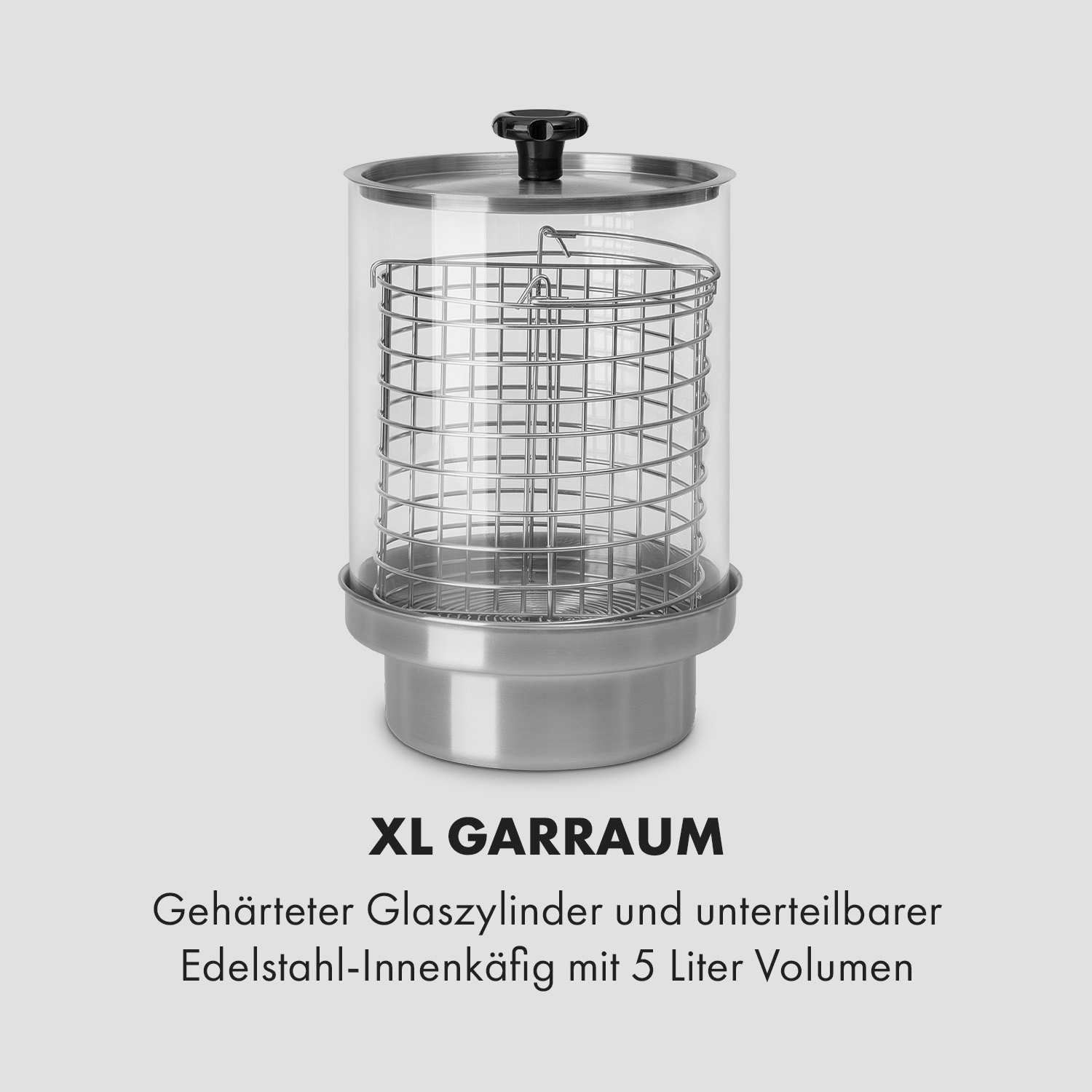 Edelstahlbehälter mit klarem Glaszylinder, innerem Drahtgestell und schwarzem Deckel auf Weiß.