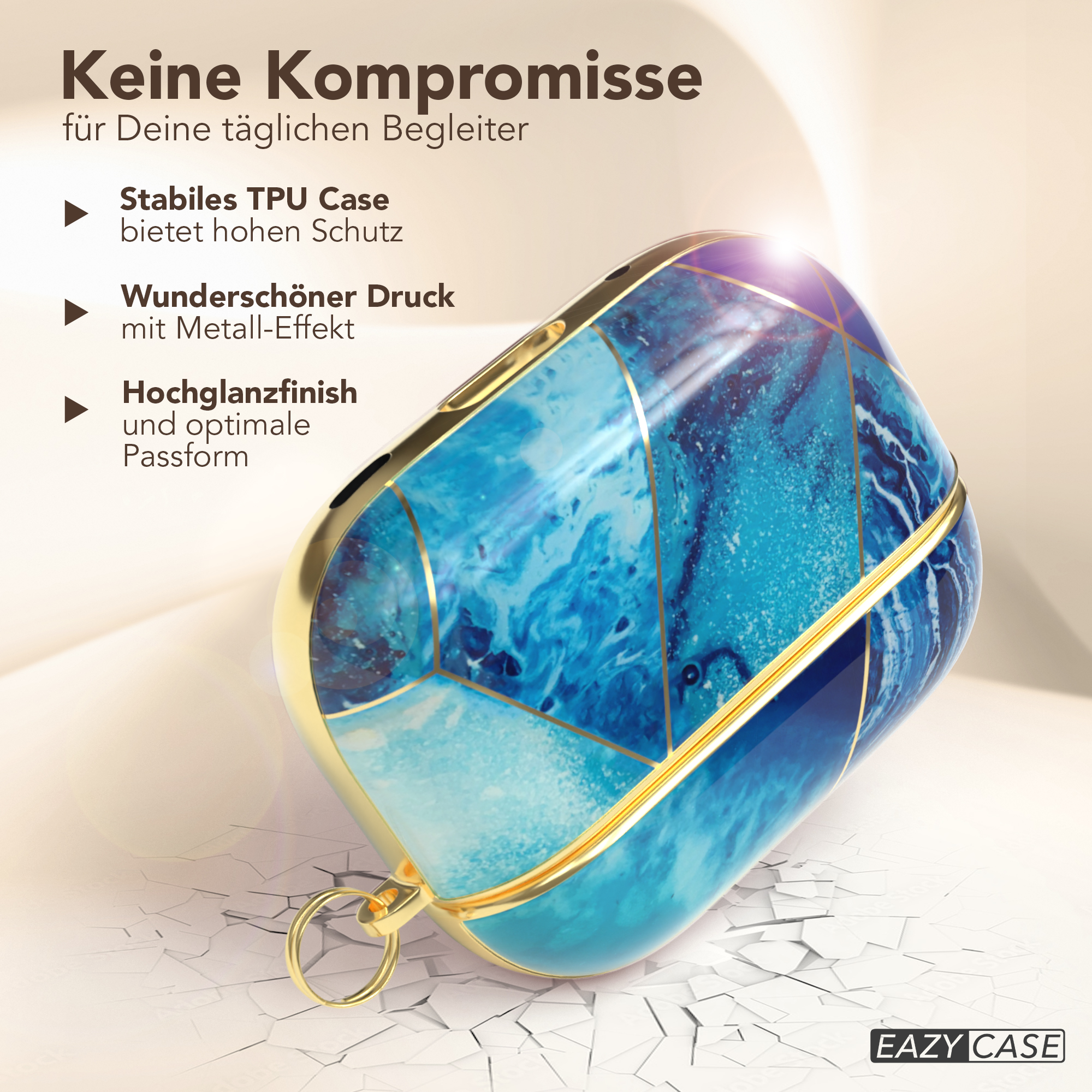 Blau-goldenes Kopfhörer-Etui auf rissiger Oberfläche.