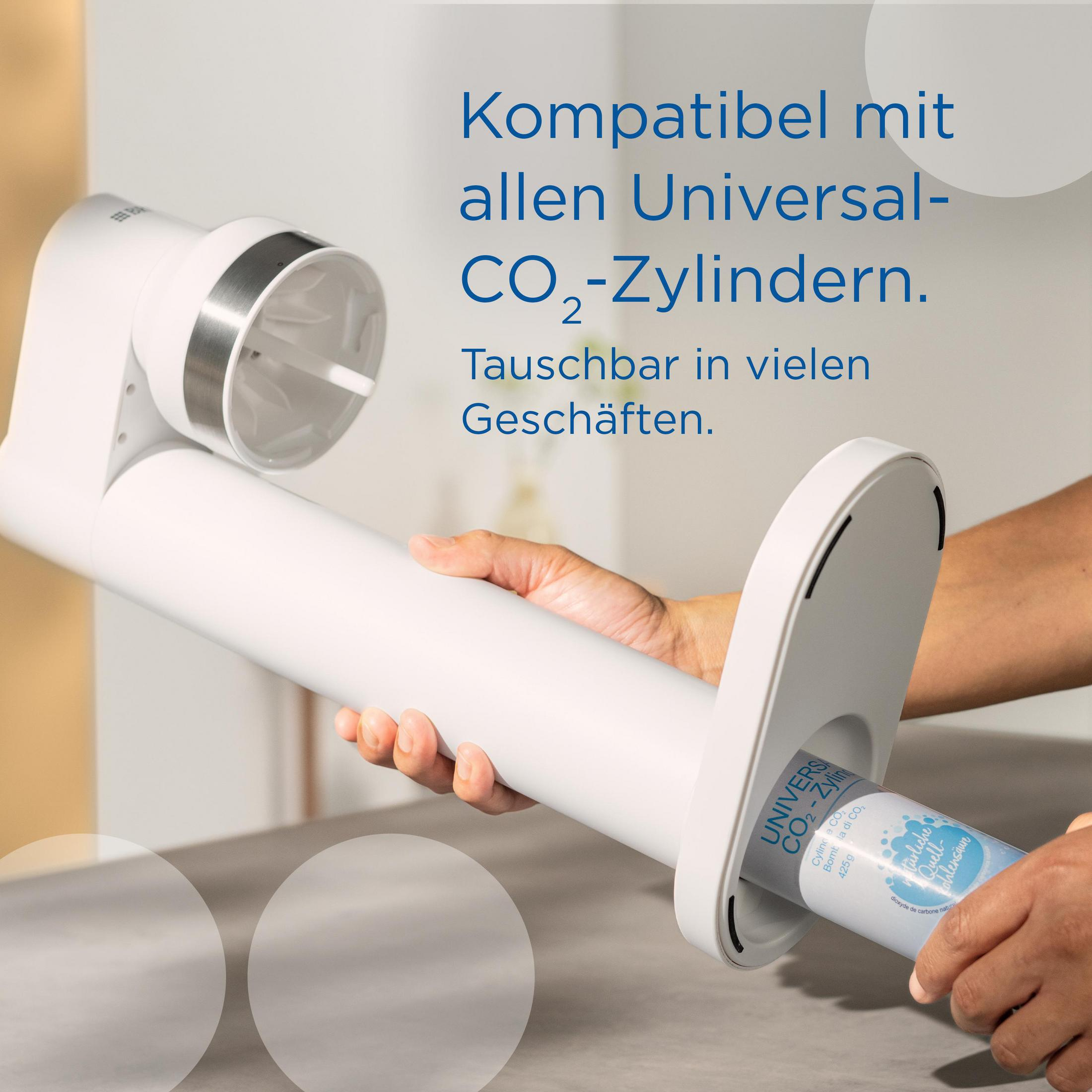 Biała maszyna z cylindrem CO2. Kompatybilna ze wszystkimi cylindrami uniwersalnymi.