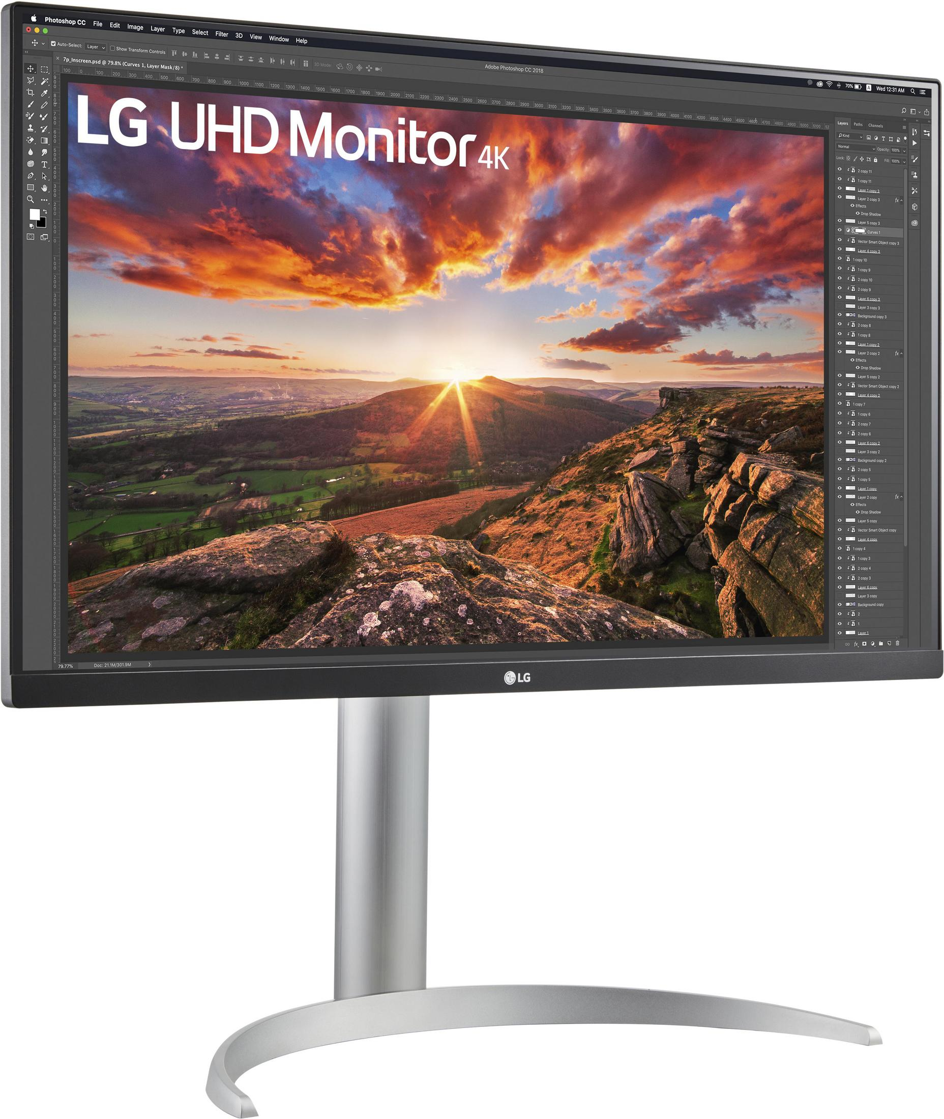 Monitor LG UHD 4K, su sfondo bianco. Mostra un'immagine di un tramonto.