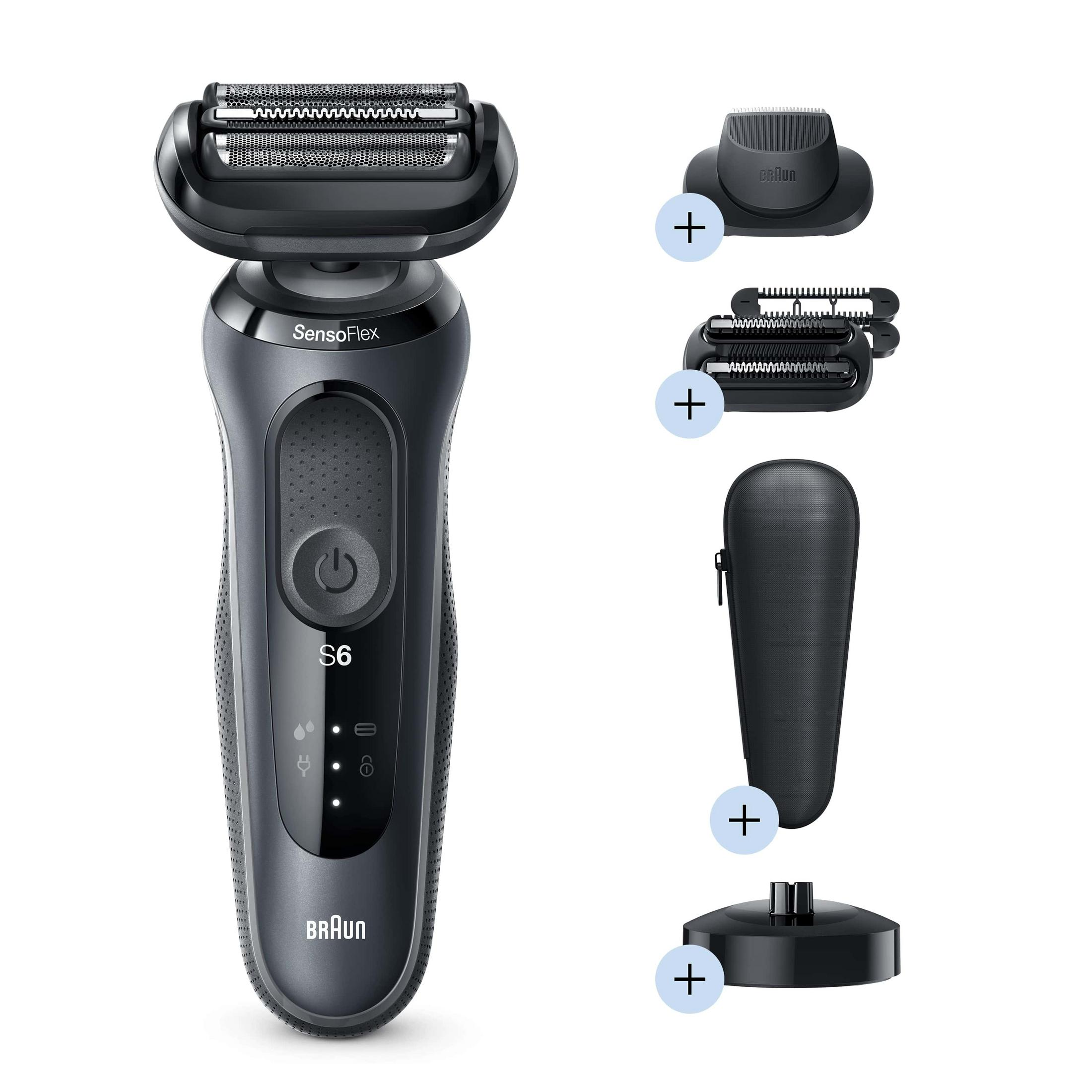 Gray Braun electric shaver with additional heads and accessories. Includes charging base and travel case.