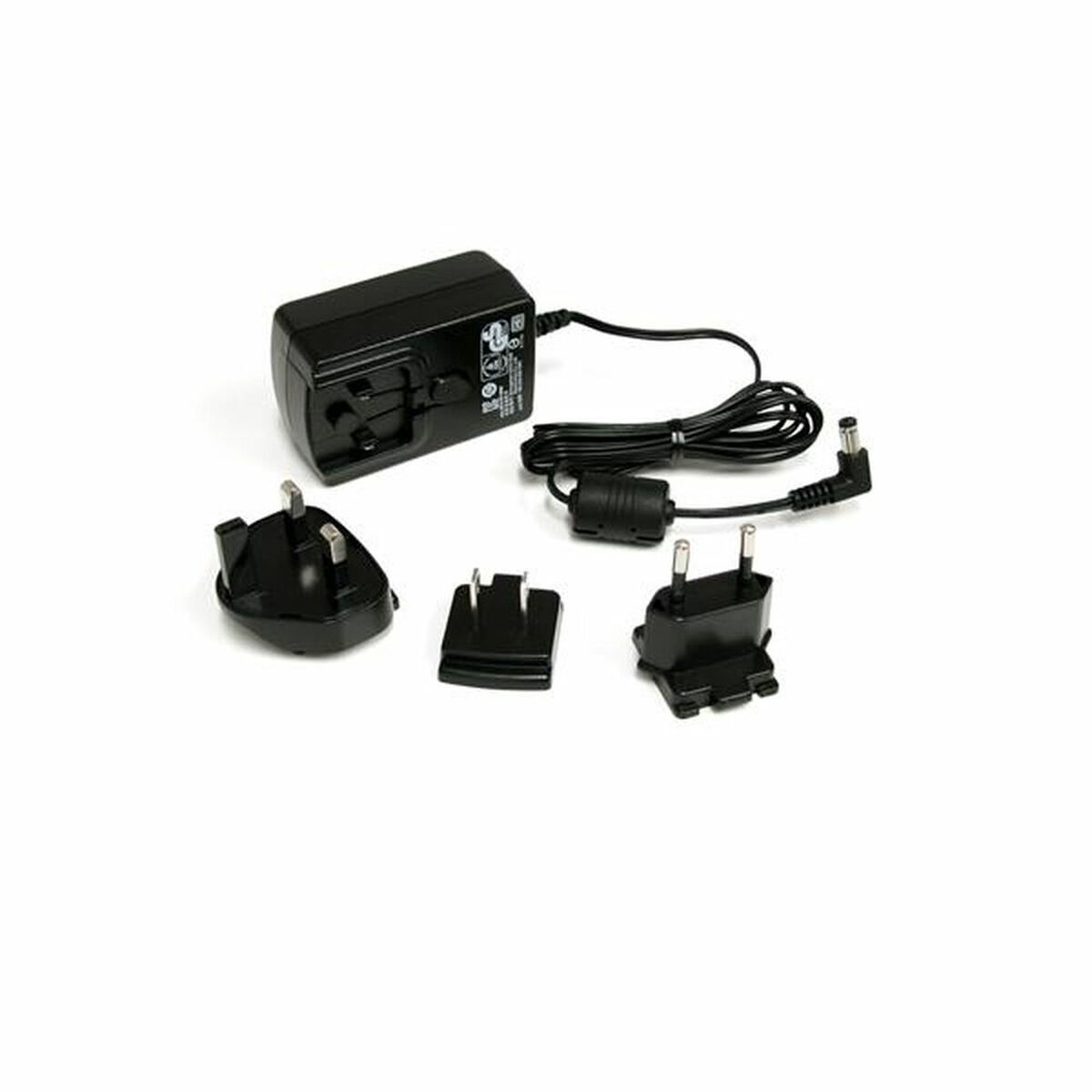 Adaptador de corriente negro con varios adaptadores.