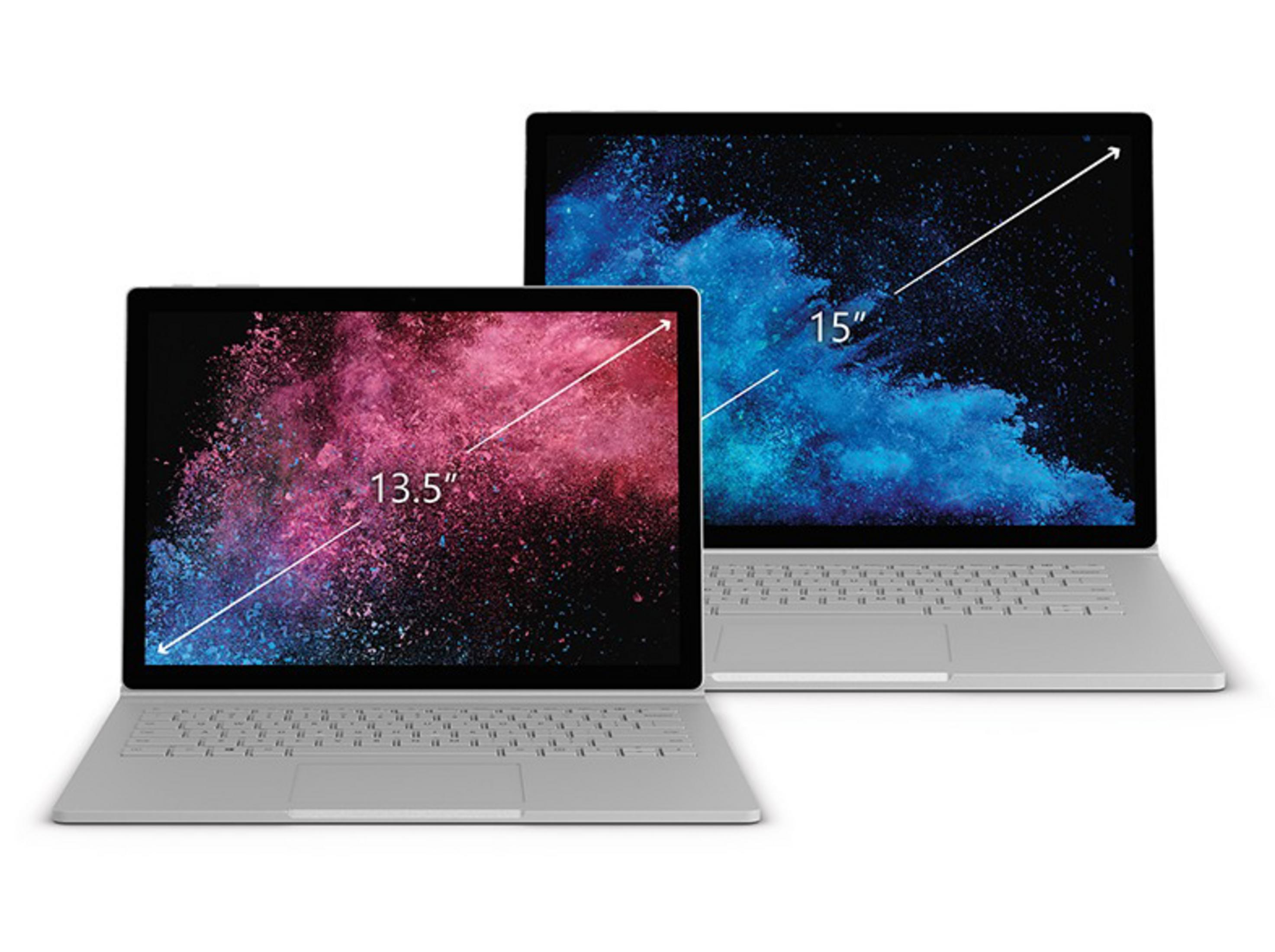 Zwei silberne Laptops, einer 13,5" und der andere 15" groß, nebeneinander.